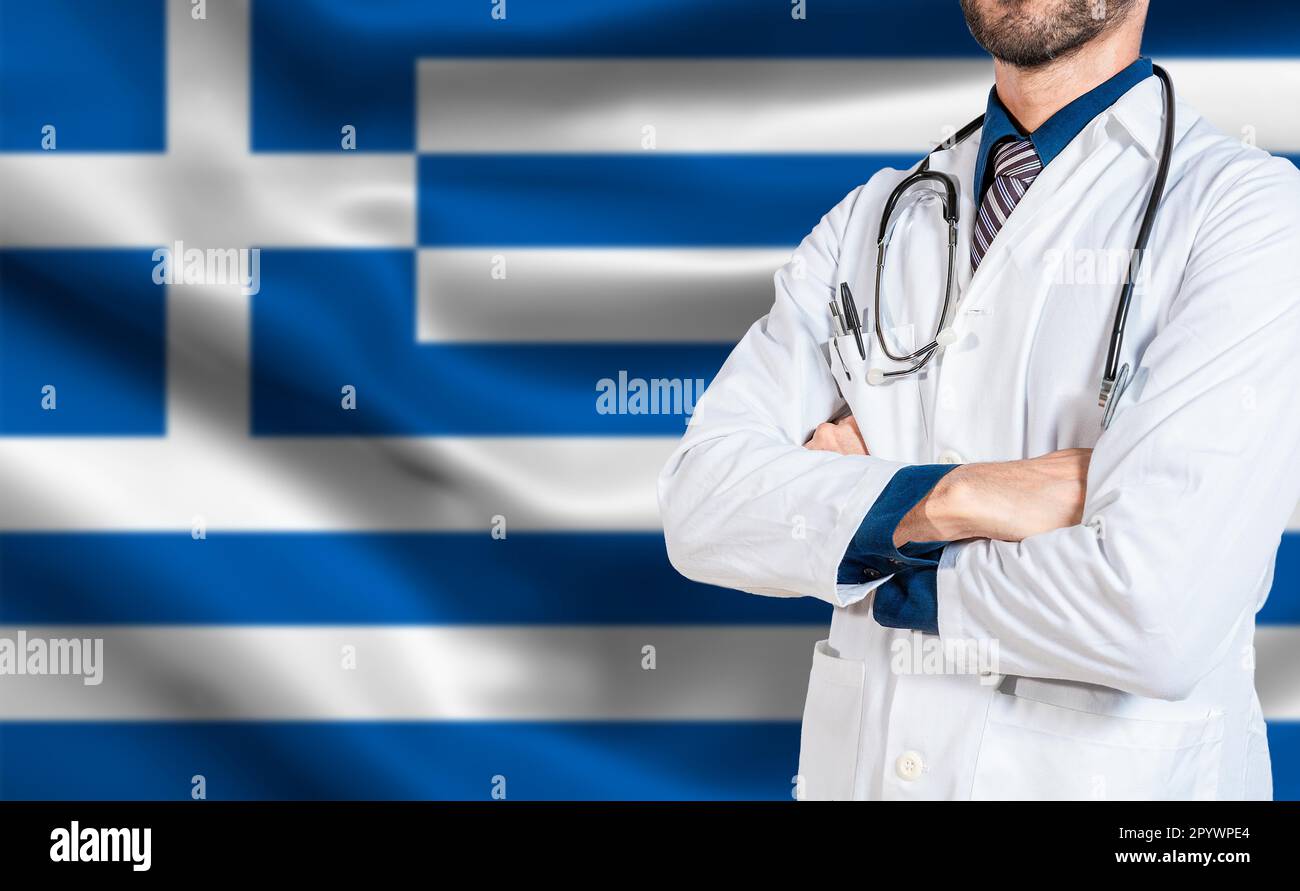 Doctor arms crossed with stethoscope over greece flag. Health and care