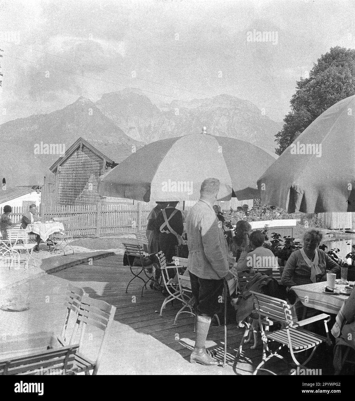 Beer garden of a business in Berchtesgadener Land. In the background