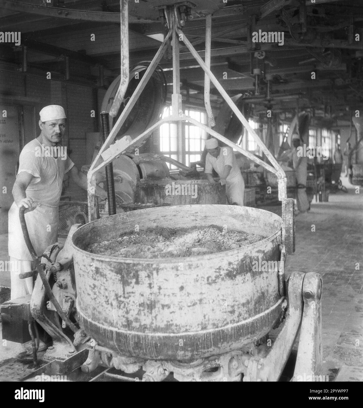 Preparation of dough in the wholesale bakery Wittler. After the First