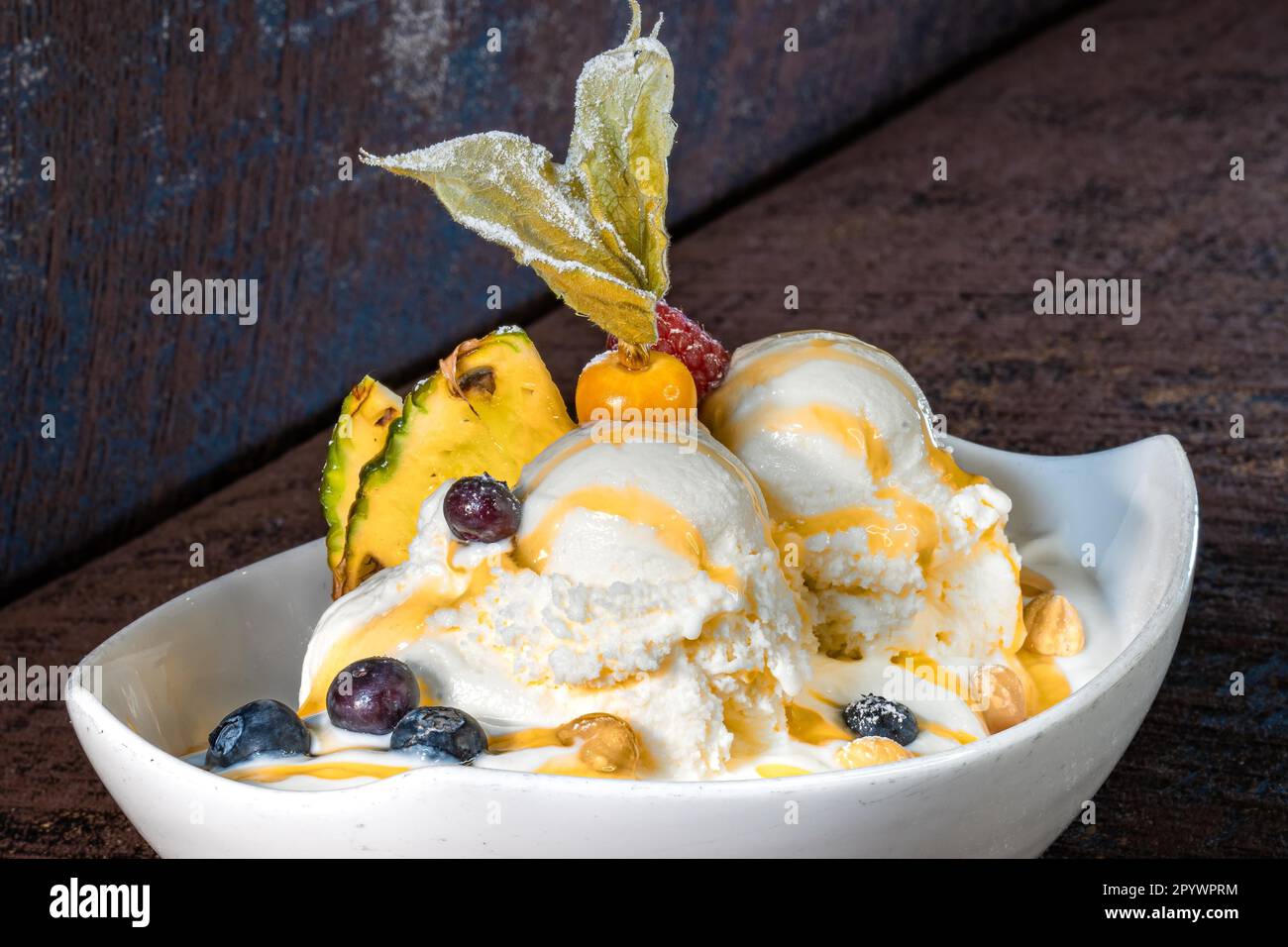 Fruit sundae on brown background Stock Photo