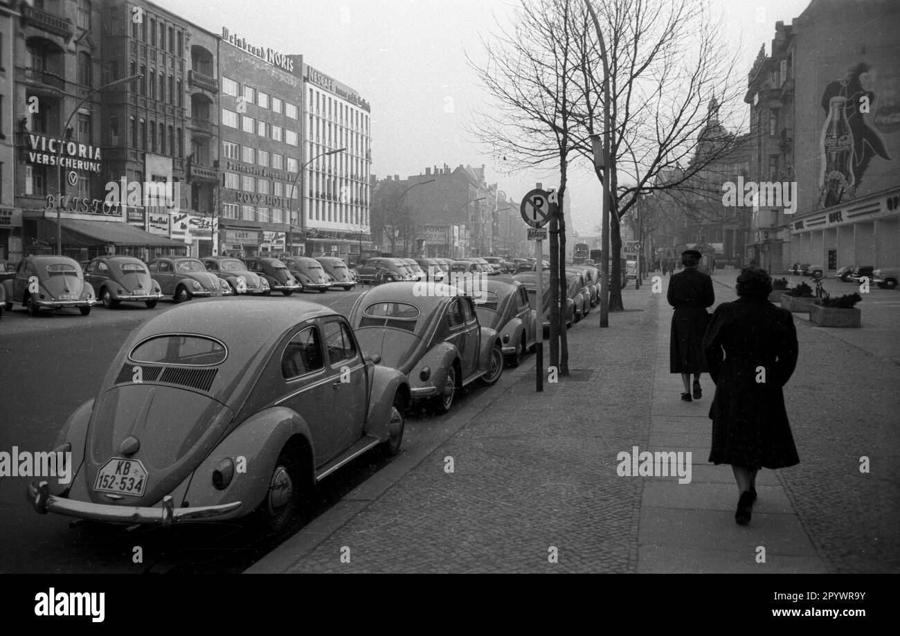 'Since 1953, the VW Beetle has been built with the oval rear window. Several Volkswagen Beetles with the nickname ''Ovalie'' stand in a street of Berlin. Undated photo, around 1953. ' Stock Photo