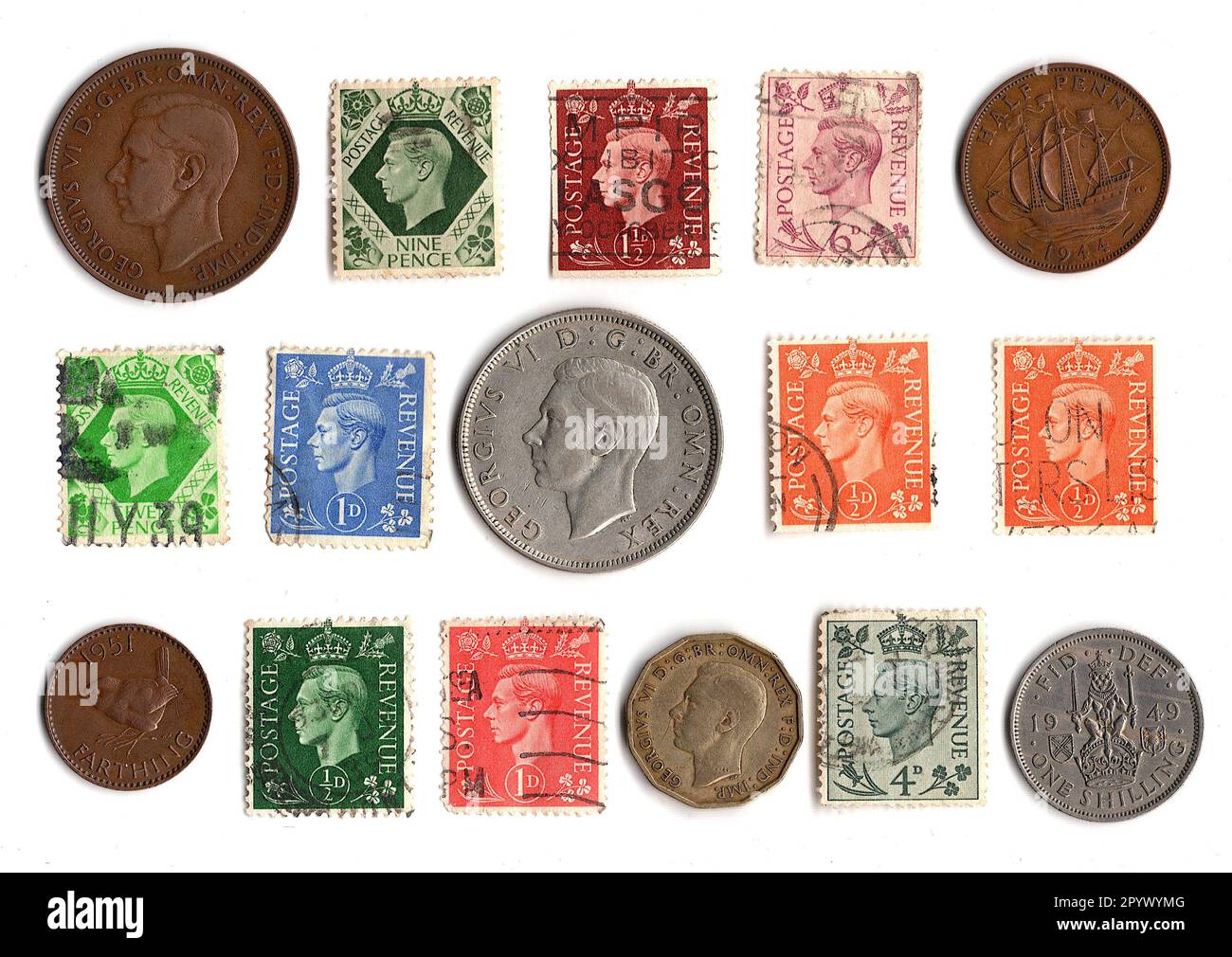Vintage coins and stamps from the reign of King VI isolated on a