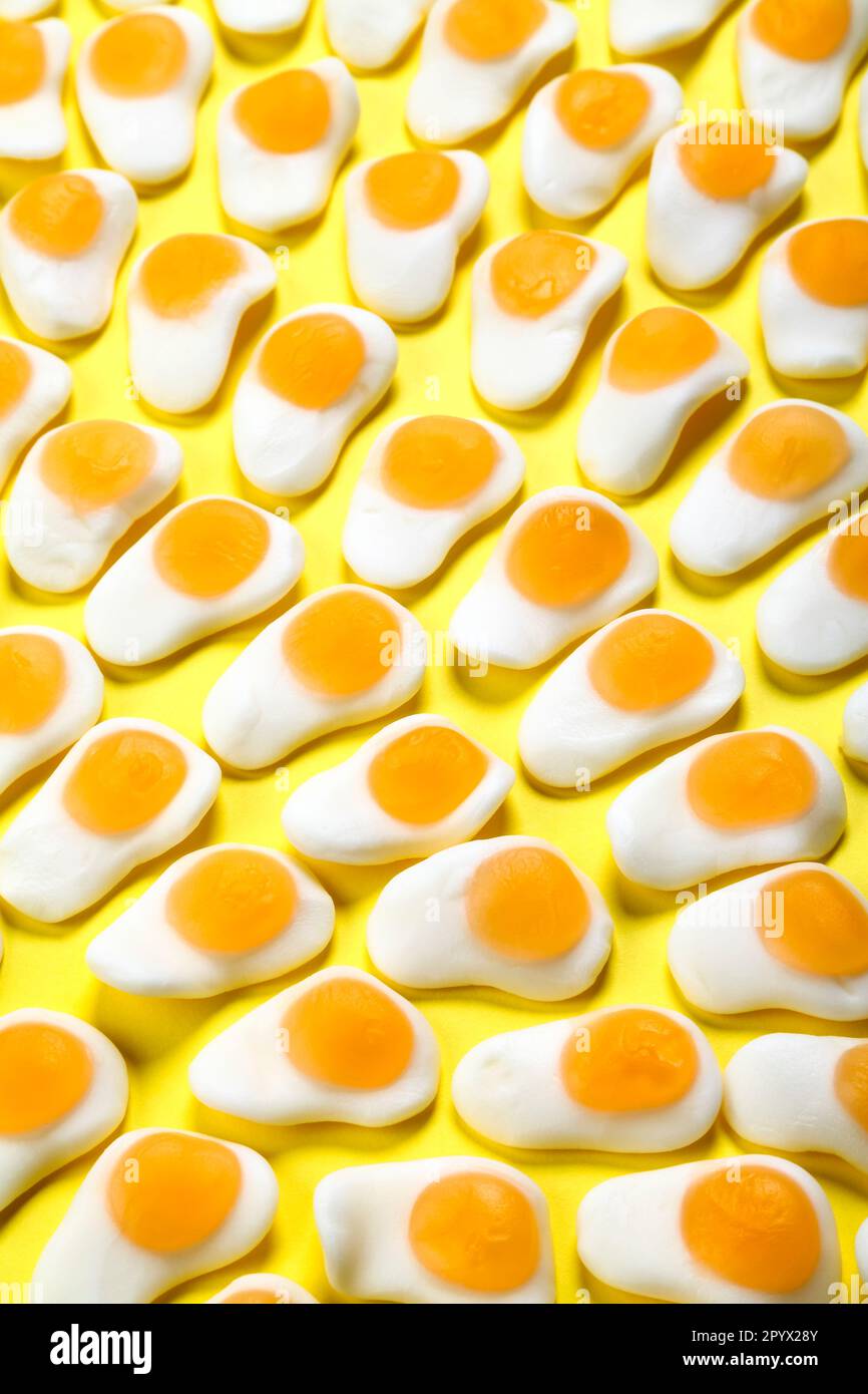 Fried egg sweets on a yellow background Stock Photo