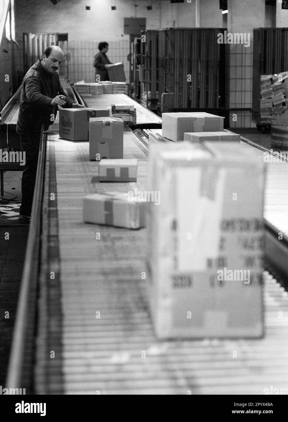 DEU , GERMANY Employees in a distribution centre for parcels of