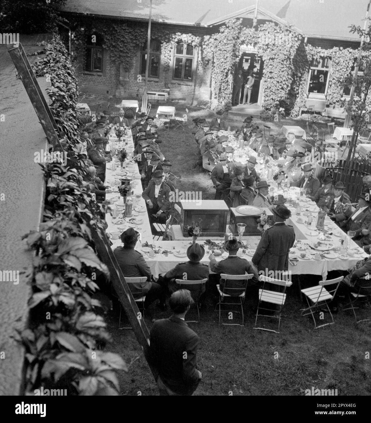 Overview of the festive table during a speech at the celebration of a