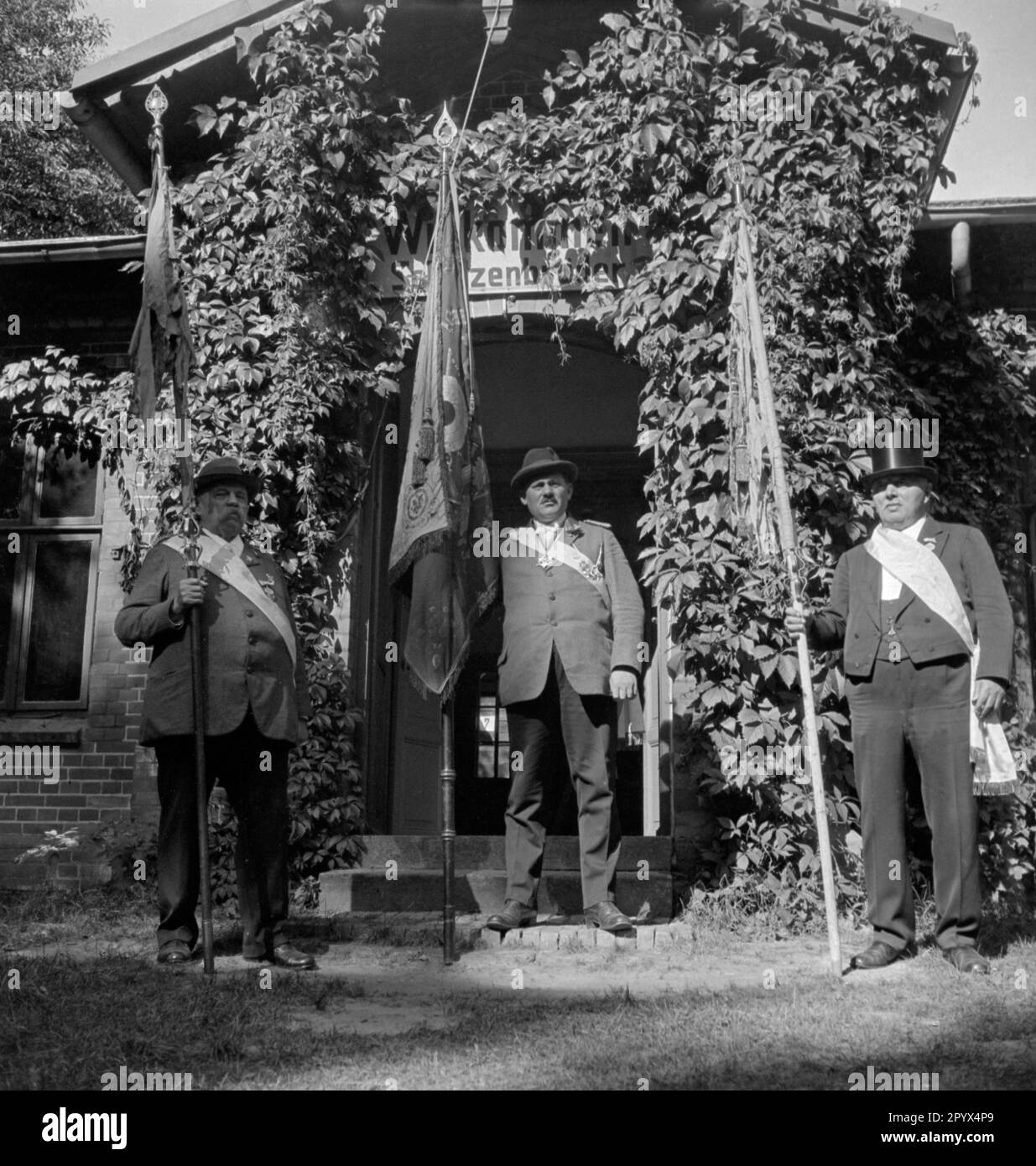 "In front of the entrance to the clubhouse of a Rostock shooting club