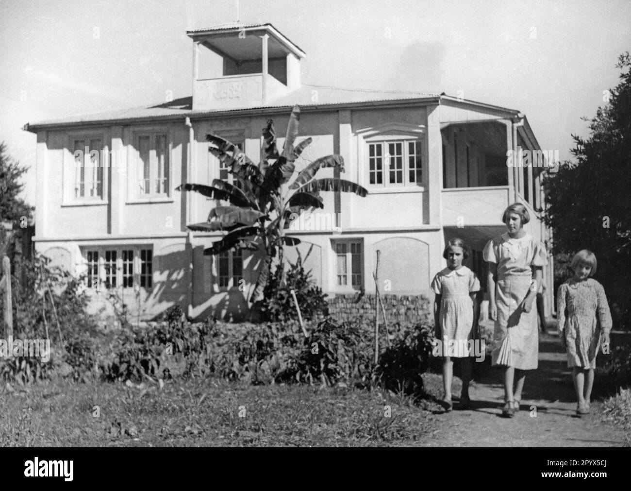 German immigrants in Argentina in front of their house. [automated
