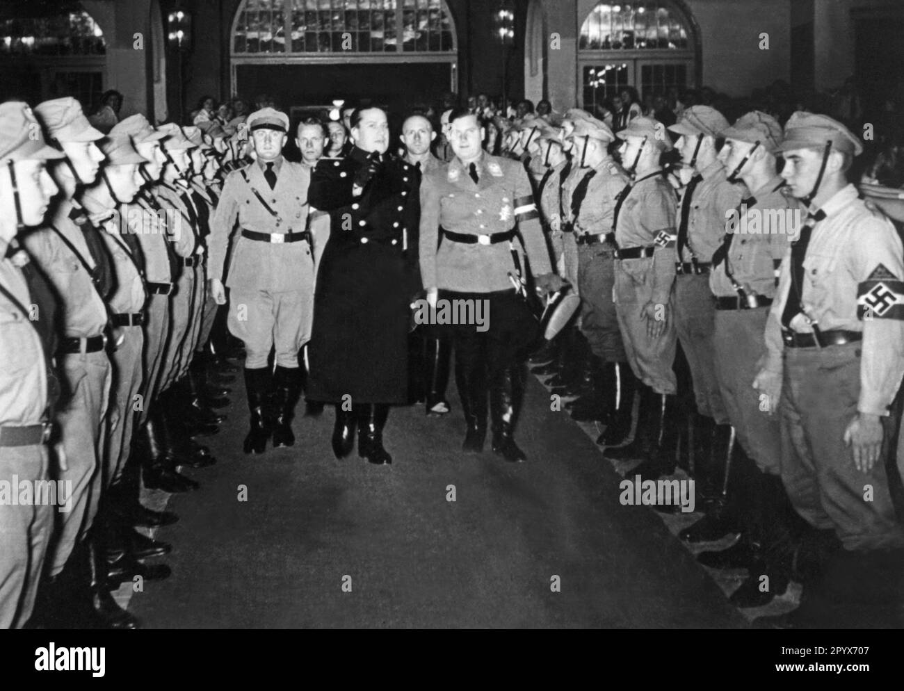 Baldur Benedikt von Schirach at a rally of the Hitler Youth in the Berlin Sports Palace. Obergebietsführer Arthur Axmann, Count Galeazzo Ciano and Baldur Benedikt von Schirach (from left). Undated photograph. [automated translation] Stock Photo