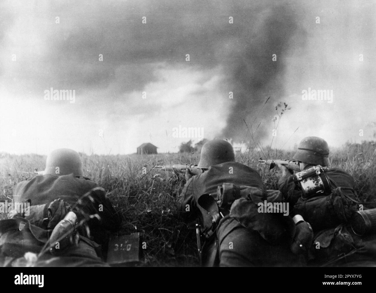 German soldiers fighting for Russian positions along the Stalin Line. [automated translation] Stock Photo