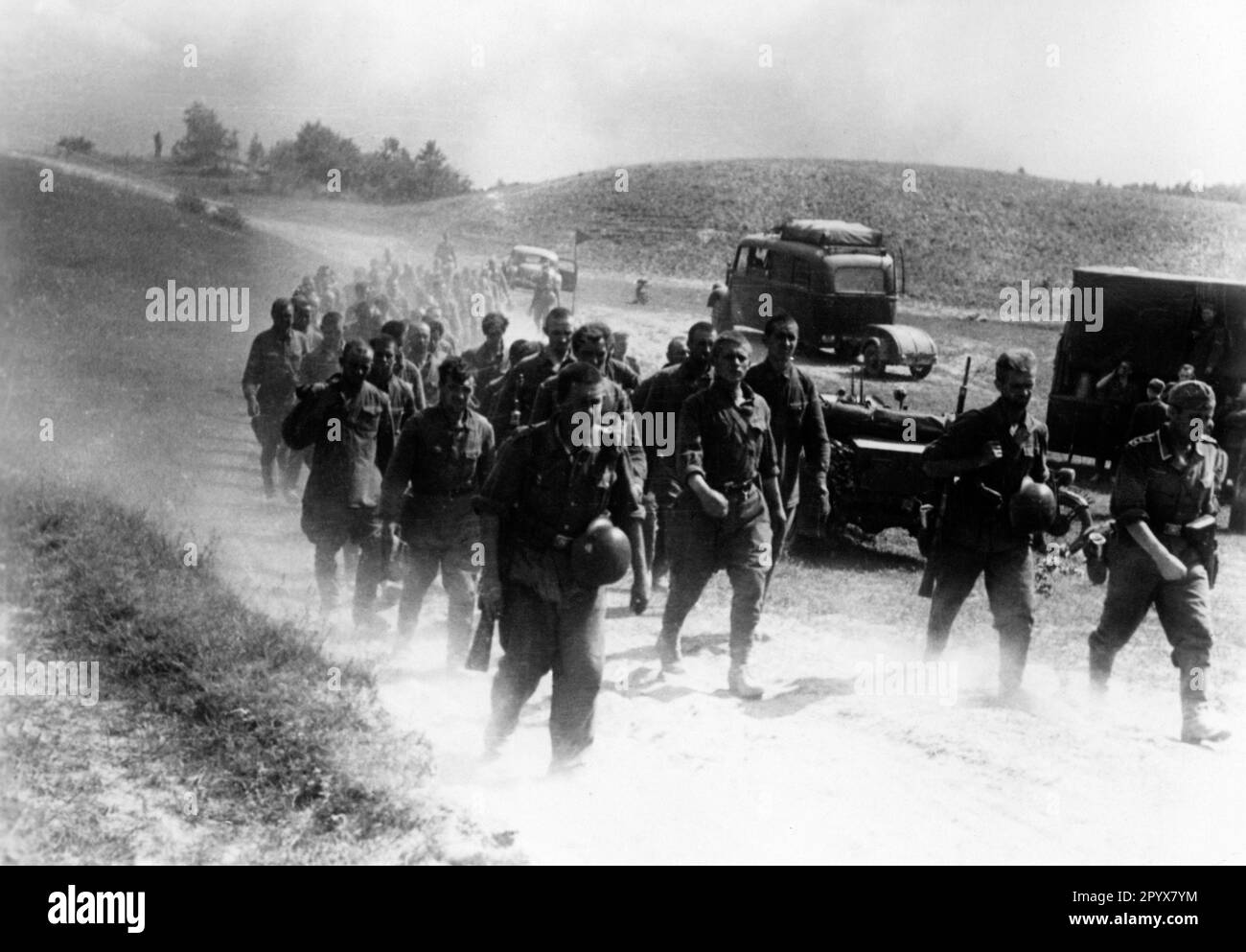 Russian soldiers captured in the fighting along the Stalin Line are led behind the front lines. Photo: Gronefeld. [automated translation] Stock Photo