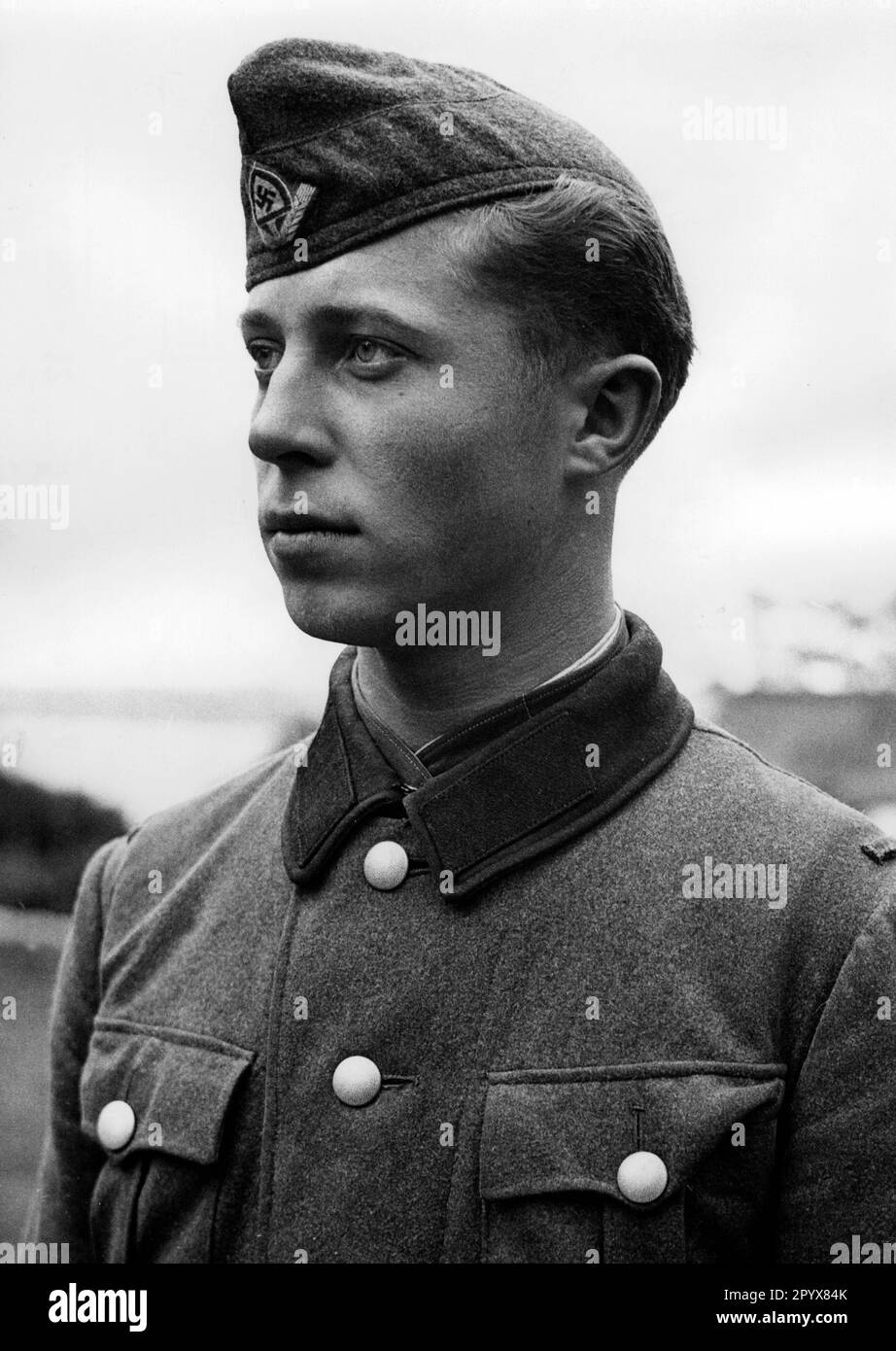 Young member of the Reich Labor Service on one of the British Channel Islands. Photo: Schwahn. [automated translation] Stock Photo