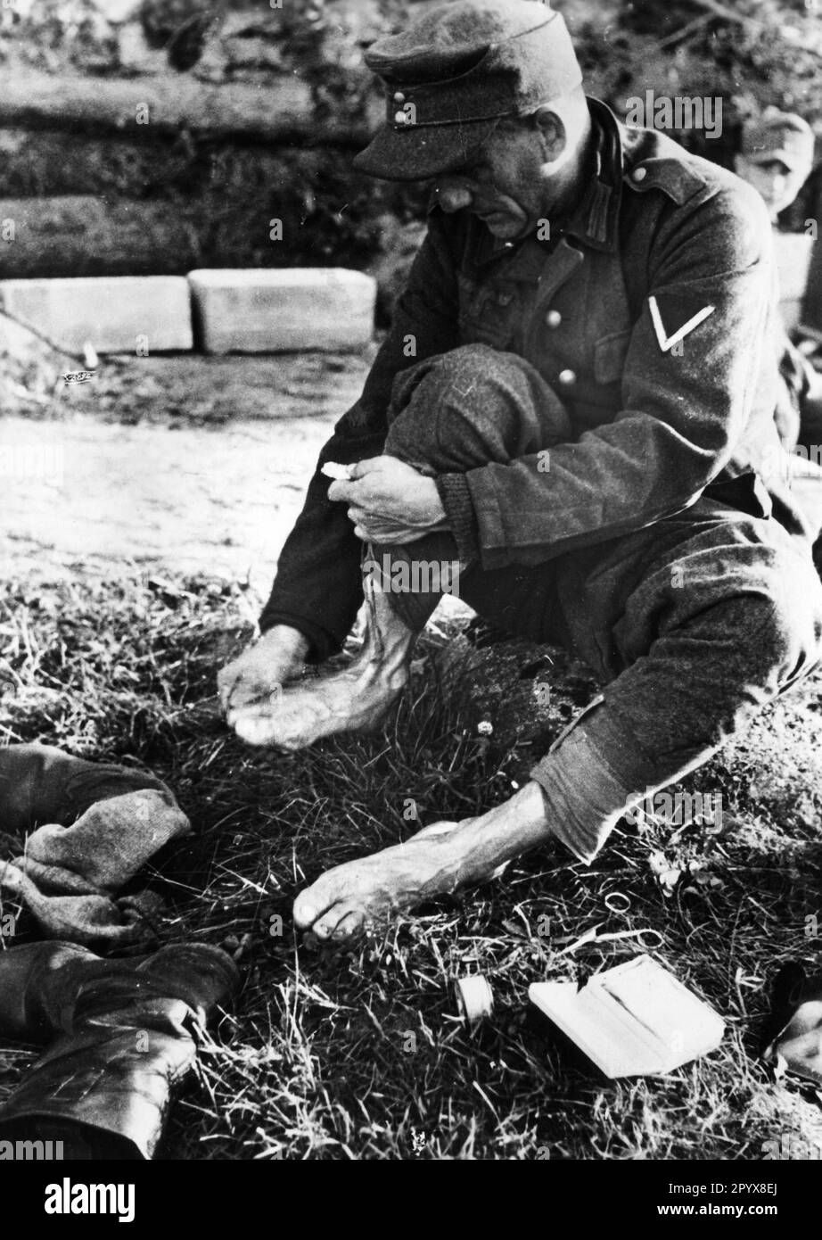 A German soldier on the Eastern Front cleans his feet. Photo: Kaiser ...