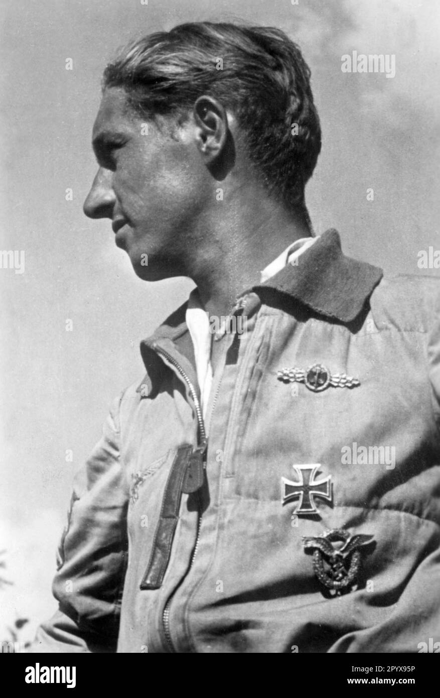 'The pilot of a Junkers Ju 87 ''Stuka''. In addition to the Iron Cross I. Class, he wears the Golden Front Flying Plane. On his chest he also wears the pilot's badge. Photo: Wundshammer [automated translation]' Stock Photo