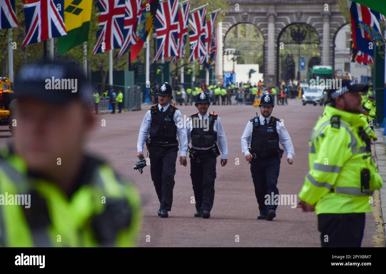 London, UK. 5th May 2023. Police officers with a video camera patrol