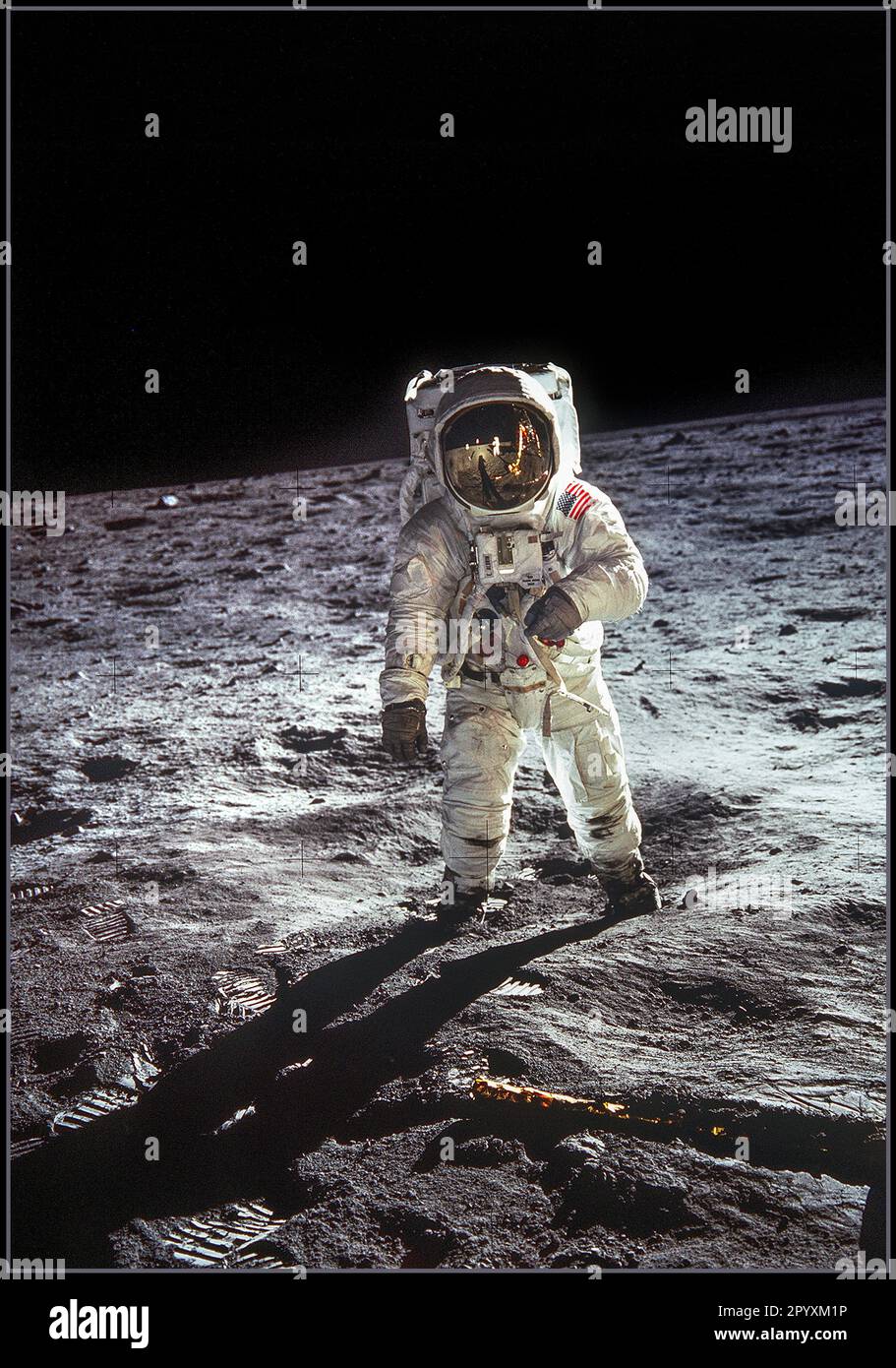 APOLLO 11. 20th July 1969 Astronaut Buzz Aldrin, lunar module pilot, walks on the surface of the Moon near the leg of the Lunar Module (LM) 'Eagle' during the Apollo 11 extravehicular activity (EVA). Astronaut Neil A. Armstrong, commander, took this photograph with a 70mm lunar surface camera. While astronauts Armstrong and Aldrin descended in the Lunar Module (LM) 'Eagle' to explore the Sea of Tranquility region of the Moon, astronaut Michael Collins, command module pilot, remained with the Command and Service Modules (CSM) 'Columbia' in lunar orbit. Stock Photo