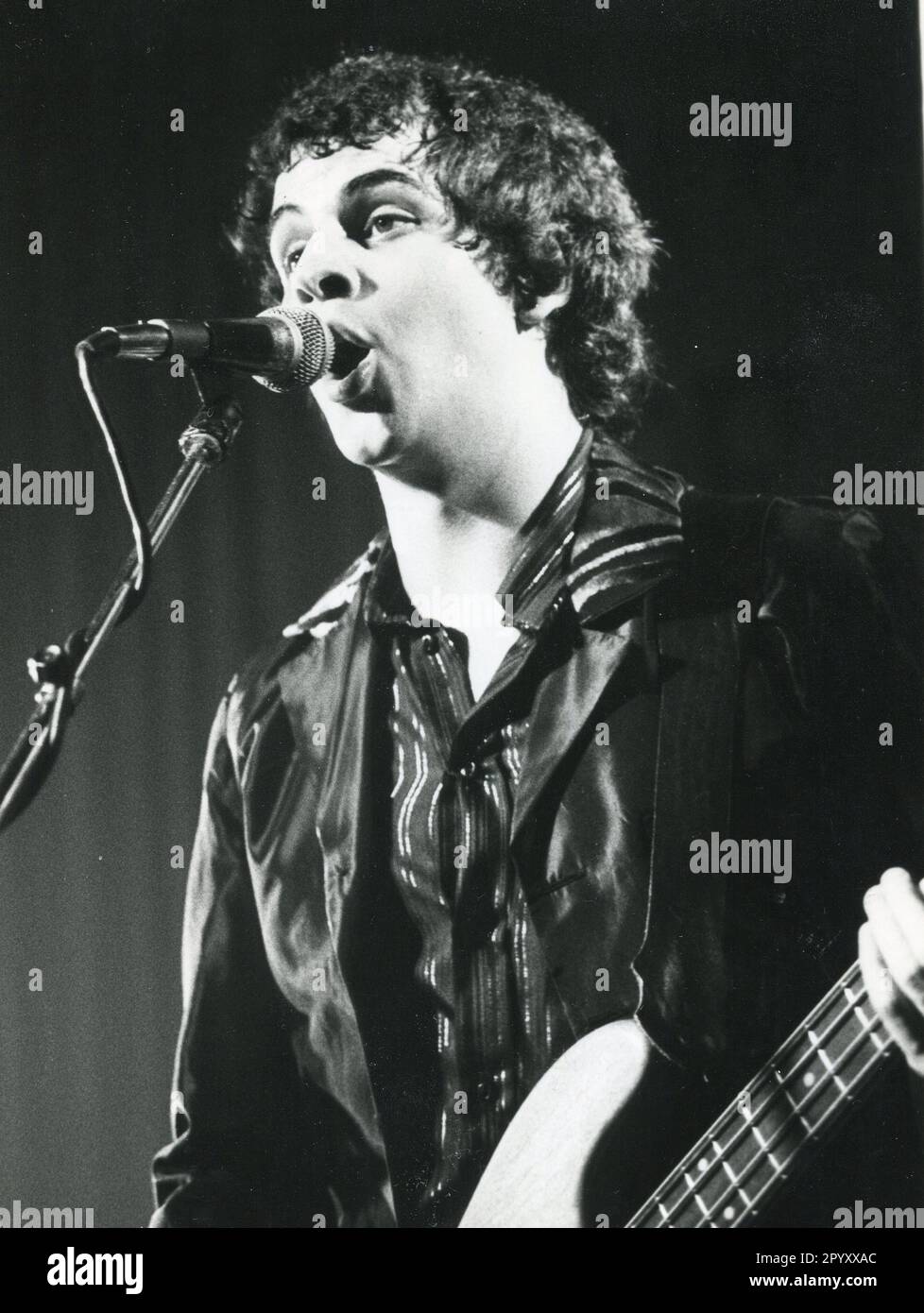 Mark Henry, bass player in British power pop band The Boyfriends, performs in London on July 14, 1978. Stock Photo