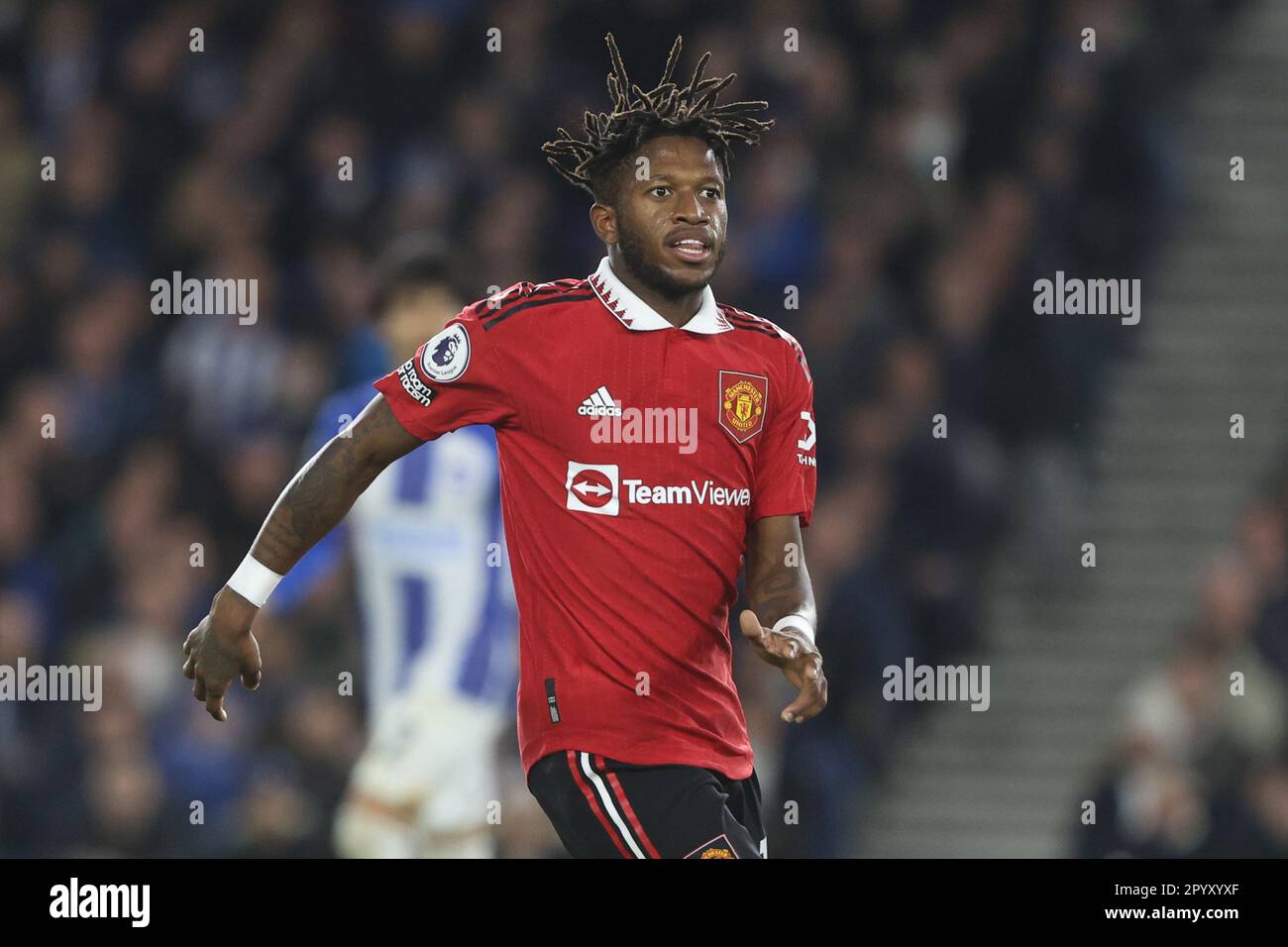Fred in action for Manchester United at the AMEX Stadium Stock Photo