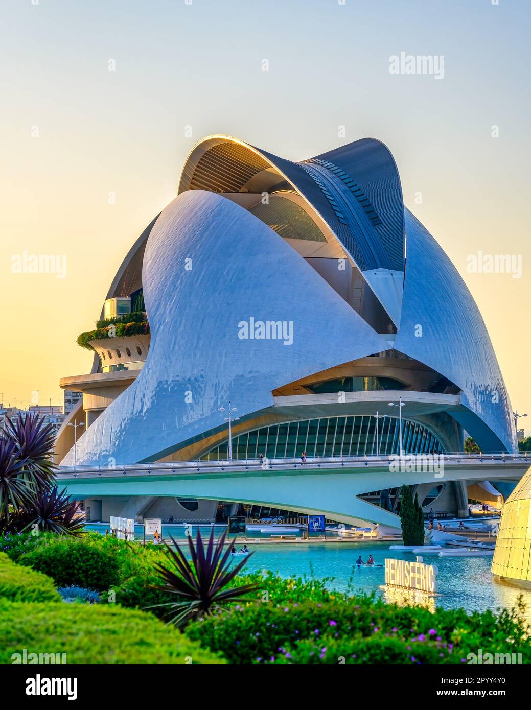 Valencia, Spain - July 17, 2022: Palau de les Arts or Palace. The famous building is framed in part of the exterior gardens. Stock Photo