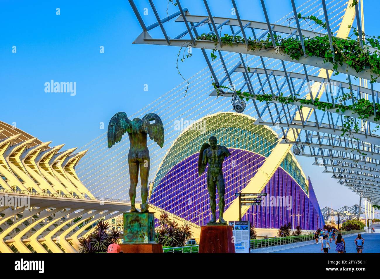 Valencia, Spain - July 17, 2022: Sculpture of bronze winged angles in the exterior areas. The 'Ciudad de las Artes y las Ciencias' is an international Stock Photo