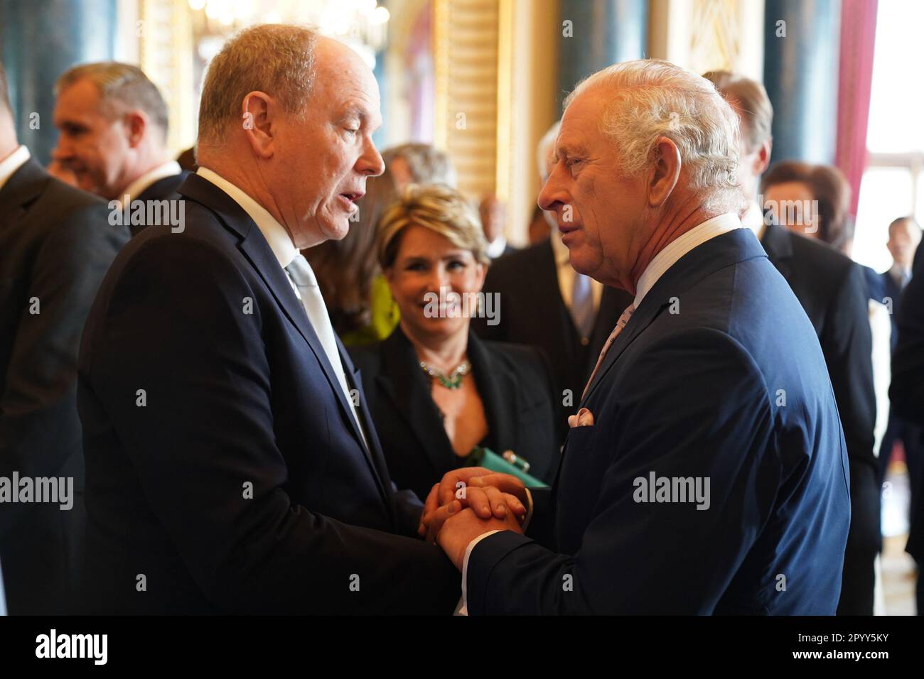 King Charles III (right) greets Prince Albert II of Monaco, during a reception at Buckingham Palace, in London, for overseas guests attending his coronation. Picture date: Friday May 5, 2023. Stock Photo