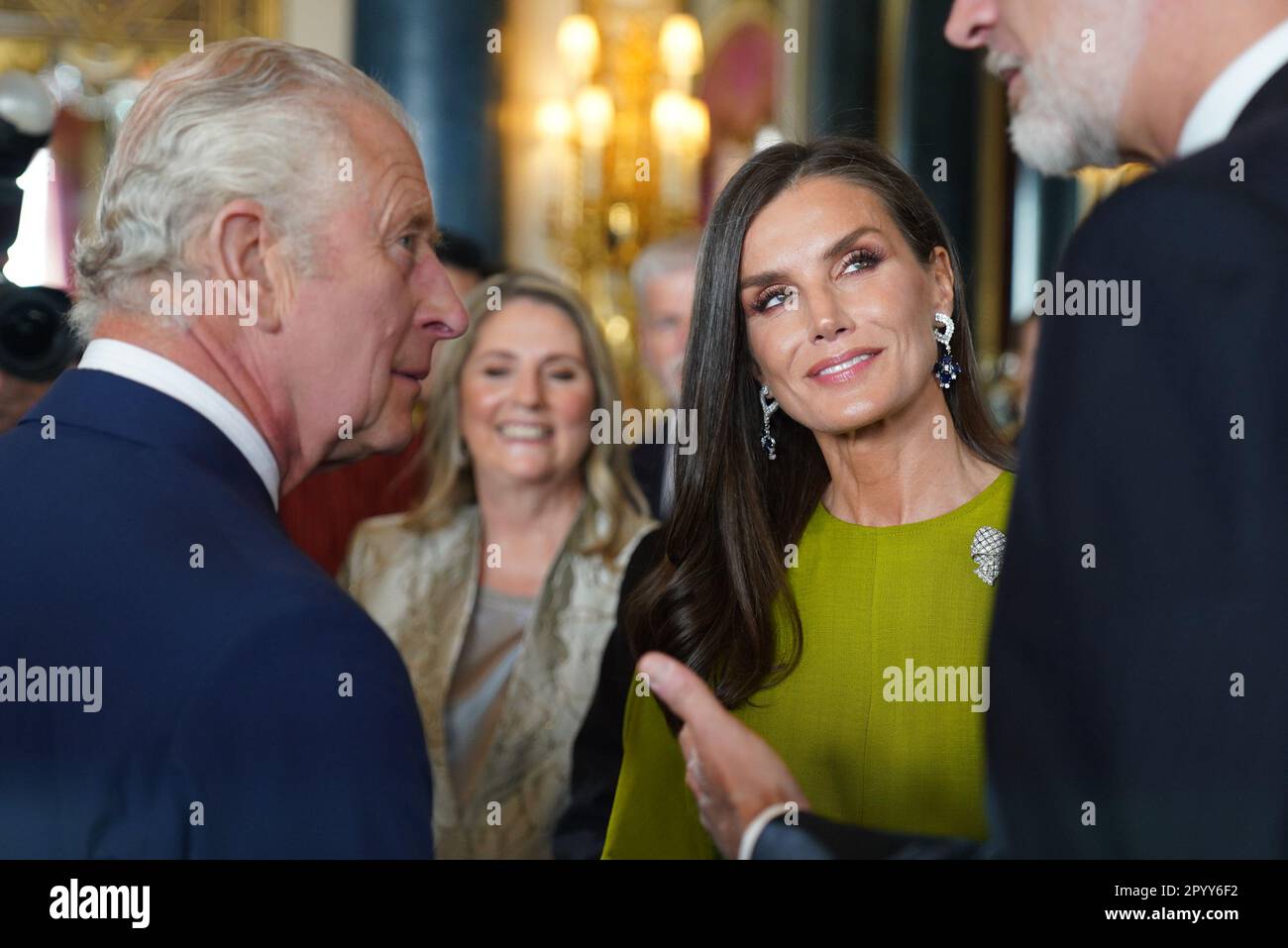 King Charles III (left) speaks to King Felipe VI and Queen Letizia of Spain, during a reception at Buckingham Palace, in London, for overseas guests attending his coronation. Picture date: Friday May 5, 2023. Stock Photo
