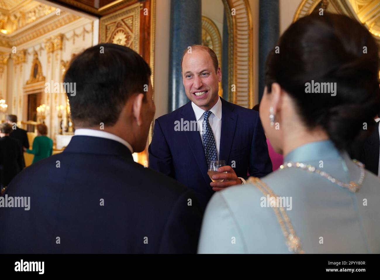 The Prince of Wales speaks to guests during a reception at Buckingham Palace, in London, for overseas guests attending the coronation of King Charles III. Picture date: Friday May 5, 2023. Stock Photo