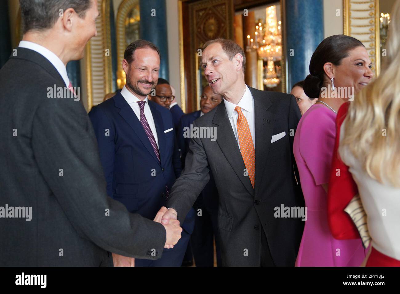 The Duke of Edinburgh (centre) greets guests during a reception at Buckingham Palace, in London, for overseas guests attending the coronation of King Charles III. Picture date: Friday May 5, 2023. Stock Photo
