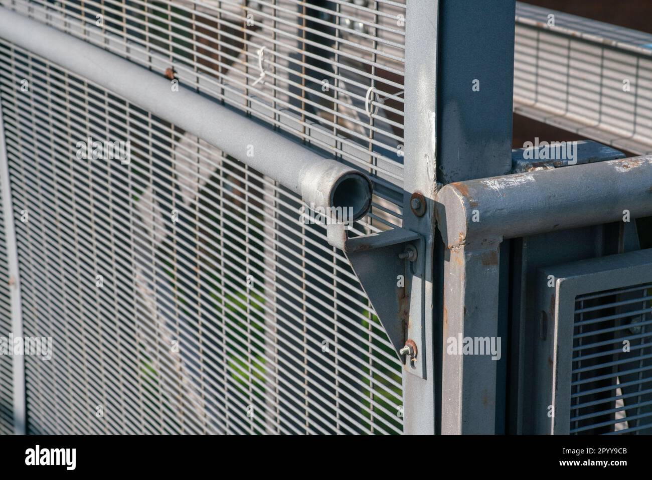 Plaform Handrail Rusting detail of the gangway handrail with elements of rust stitches and ...