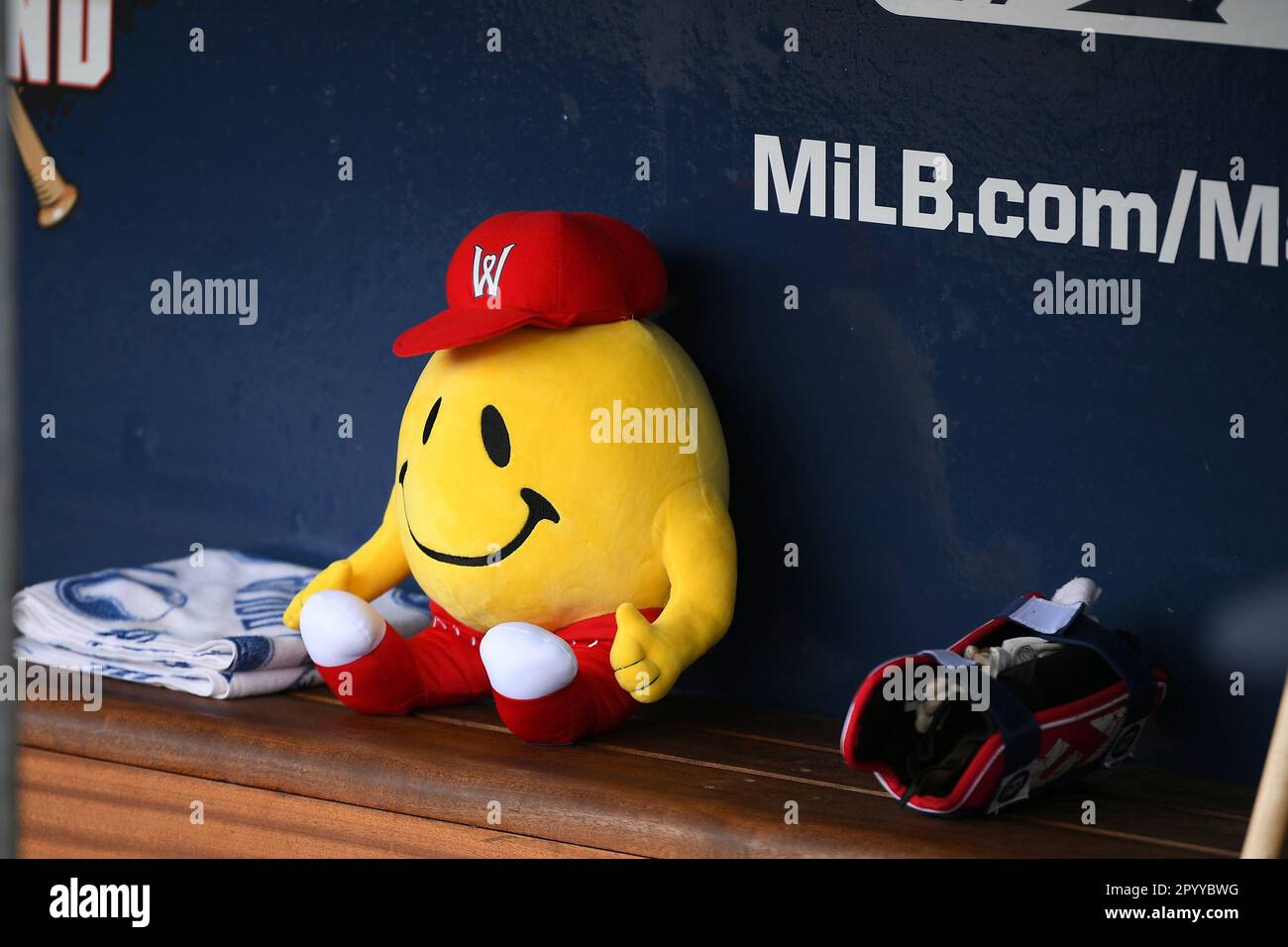 WORCESTER, MA - MAY 04: A Worcester Red Sox Smiley Ball mascot plush toy  sits in the dugout prior to game 1 of a AAA MiLB doubleheader between the  Buffalo Bisons and