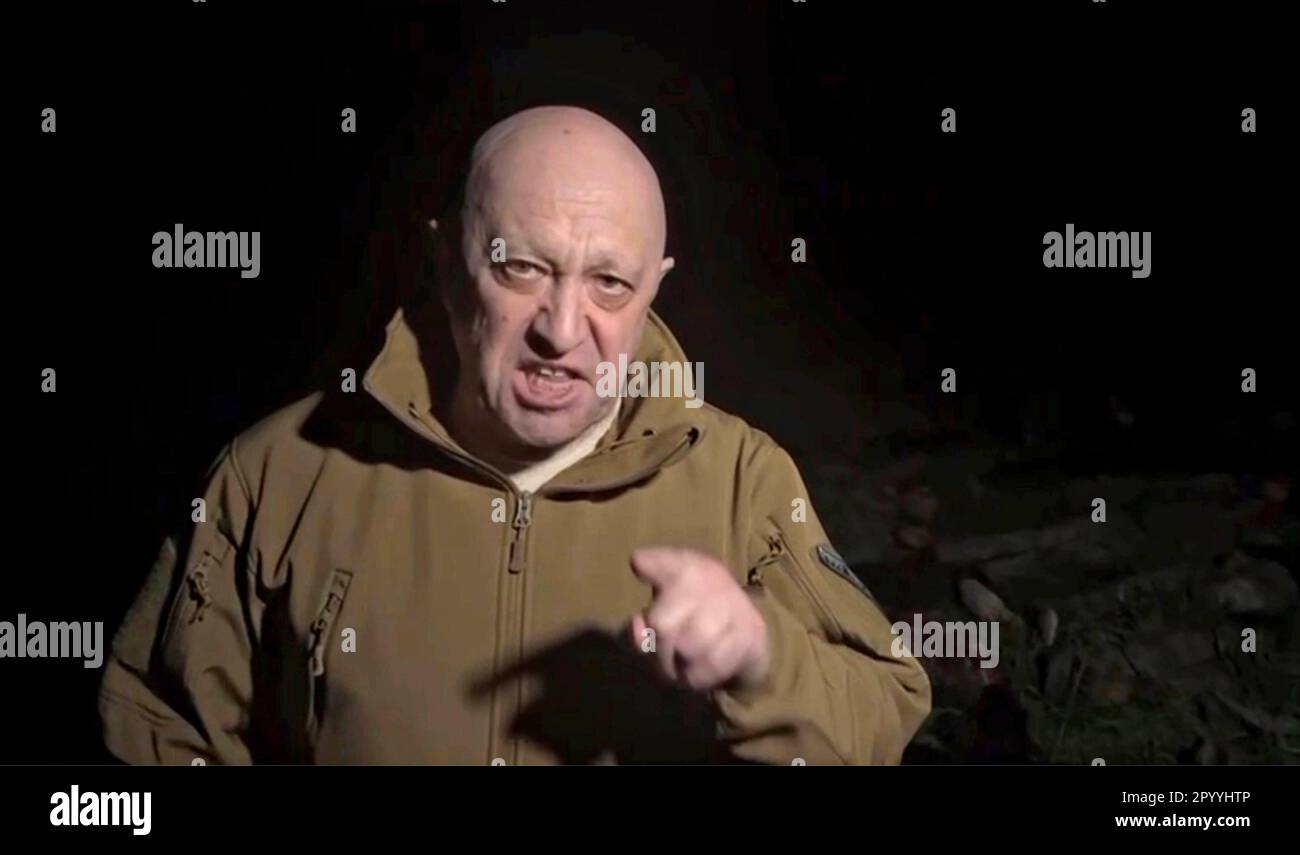 Bakhmut, Ukraine. 05th May, 2023. Russian Yevgeny Prigozhin, owner of the Wagner Group of mercenaries broadcasts a tirade against Russian Defense Minister Sergei Shoigu accusing the military command of starving his forces of ammunition and supplies, May 4, 2023 near Bakhmut, Ukraine. Prigozhin, standing in a field of bodies of his soldiers killed in battle threatened to withdraw from the frontlines. Credit: Pool Photo/Wagner Group/Alamy Live News Stock Photo