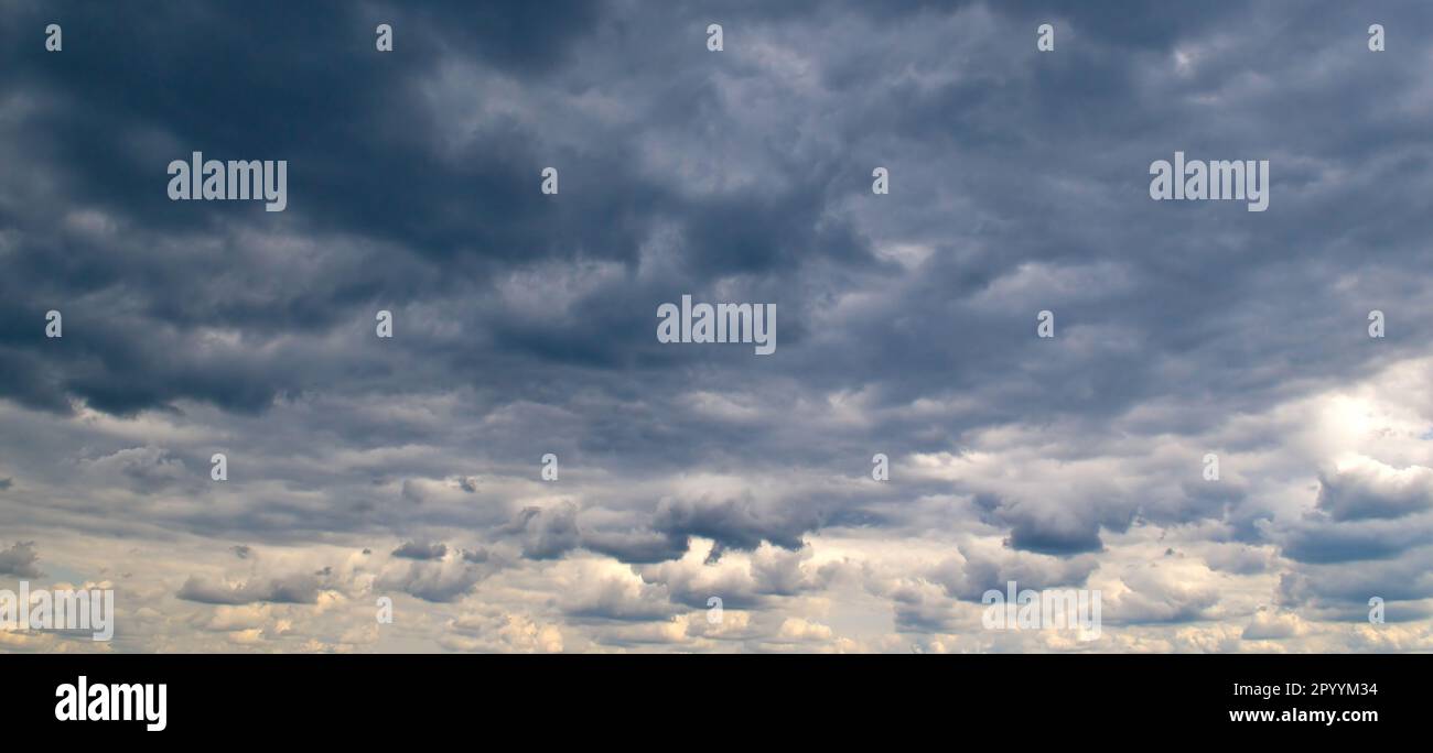 Black storm clouds and bright horizon in sky Stock Photo - Alamy