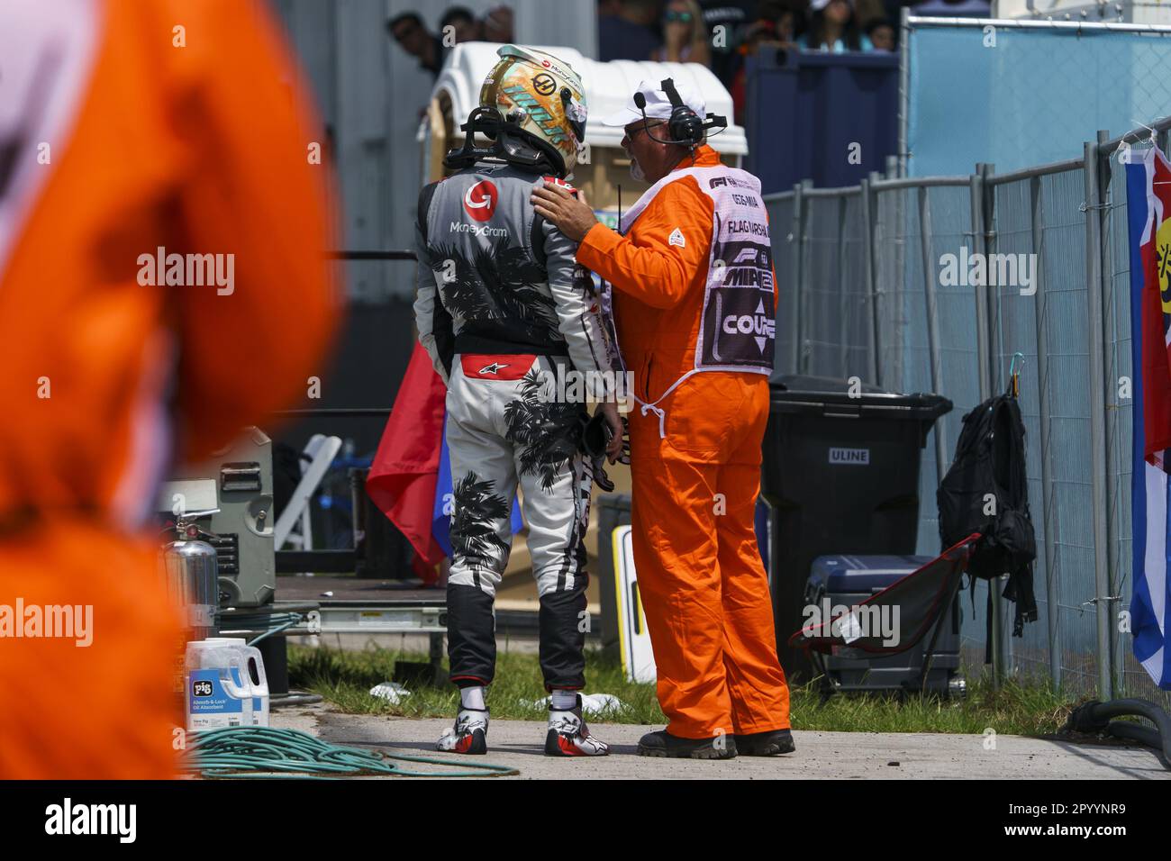Miami Gardens, United States. 05th May, 2023. A track marshal speaks to German Formula One driver Nico Hulkenberg of Haas F1 Team following a crash during the first practice session for the Formula One Grand Prix of Miami at the Miami International Autodrome in Miami Gardens, Florida on Friday, May 5, 2023. Photo by Greg Nash/UPI Credit: UPI/Alamy Live News Stock Photo