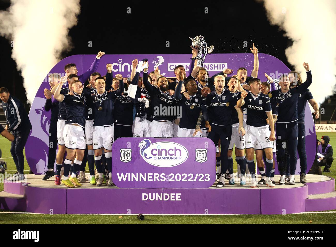 dundee-players-celebrate-with-the-trophy-after-winning-the-league