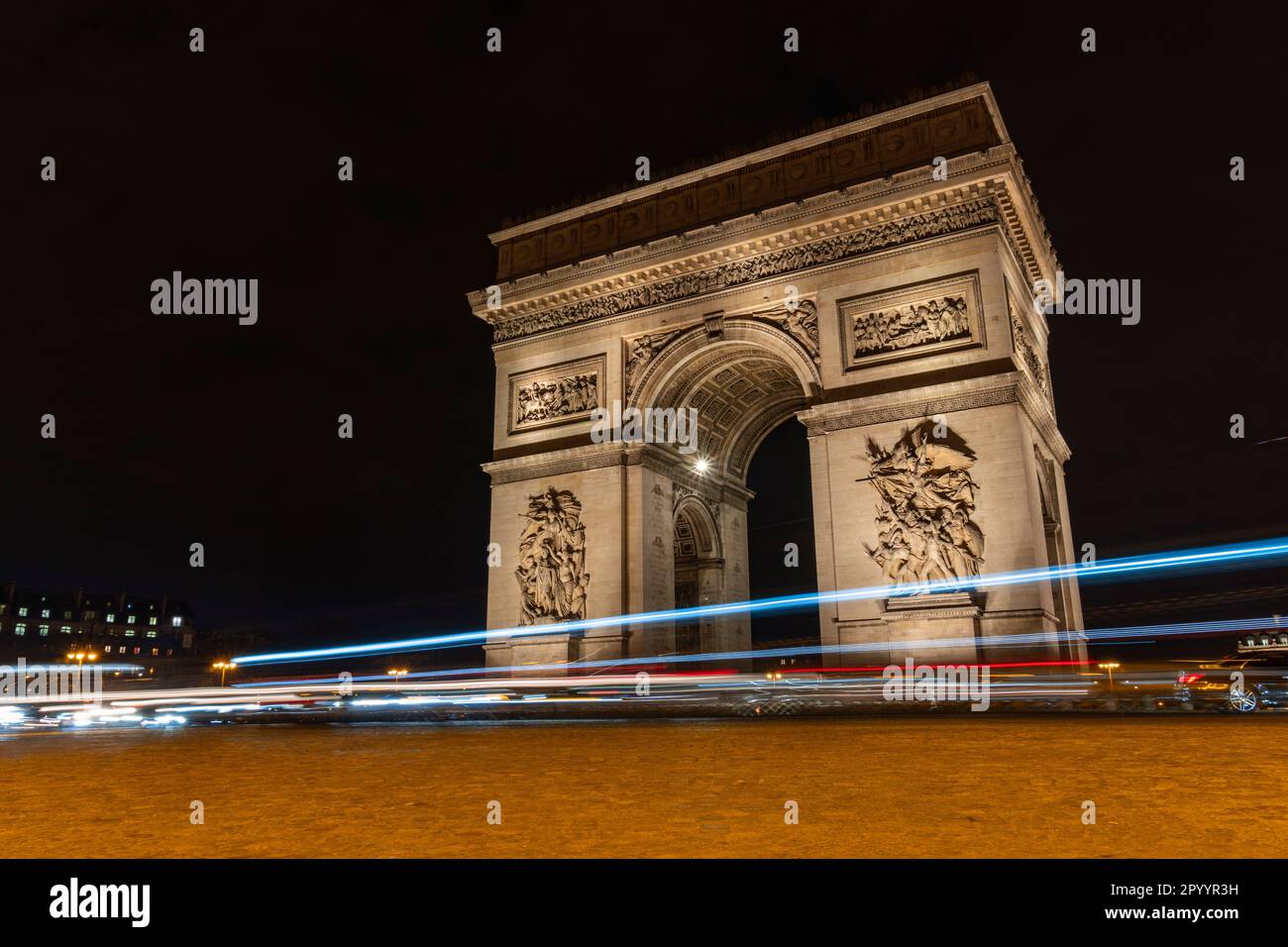 Arc de Triomphe's construction started in 1806 after Napoleon's victory at the Battle of the Three Emperors at Austerlitz. Stock Photo