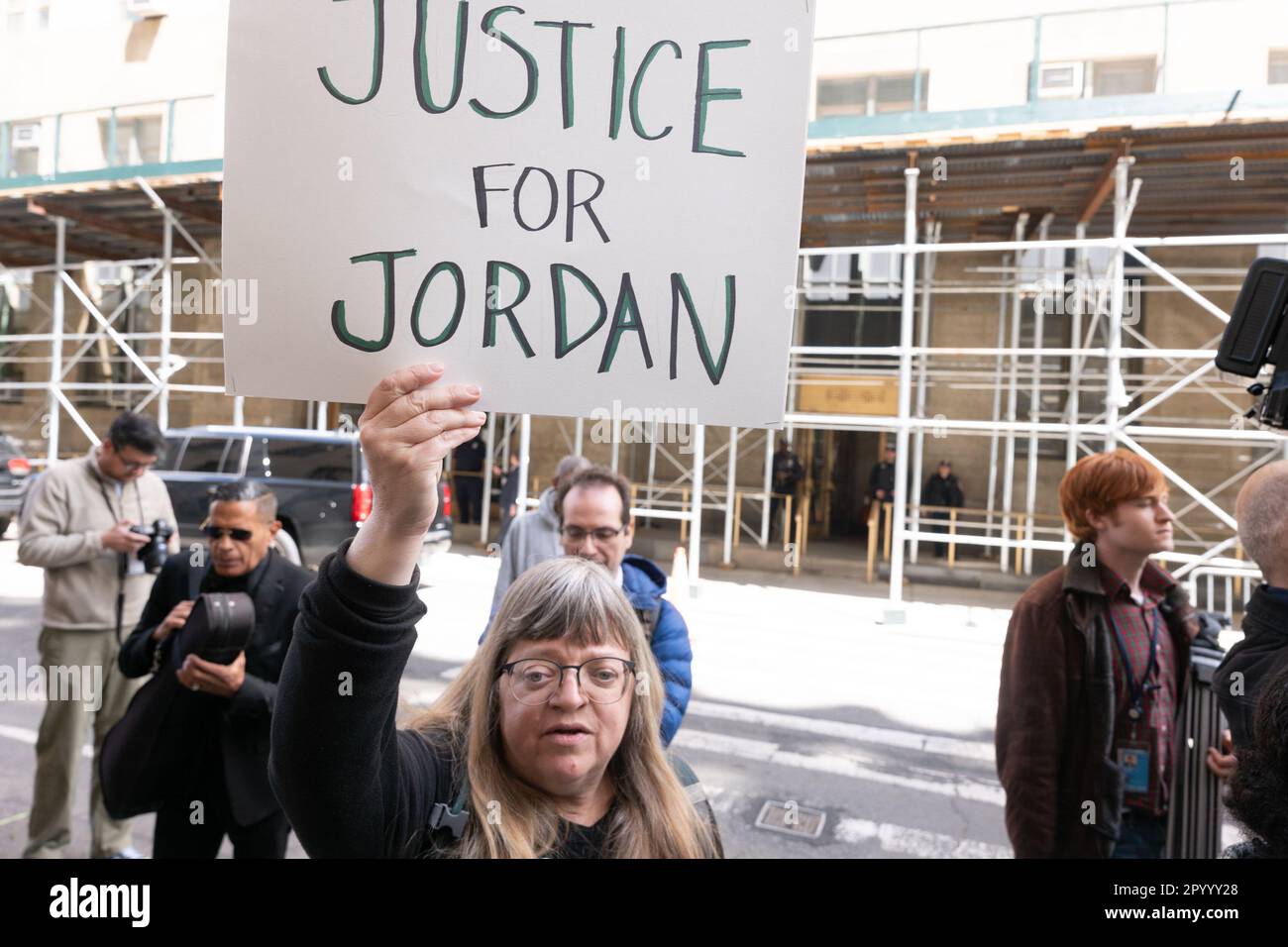 New York, New York, USA. 5th May, 2023. Demonstrators protest the killing of Jordan Neely during a demonstration at New York District Attorney Bragg's office in lower Manhattan. Neely, a homeless person as well as a New York Subway entertainer and was put into a strangle hold and subsequently died by a subway rider and ex-marine and pinned down by two other riders Charges are pending for the death of Neely. (Credit Image: © Brian Branch Price/ZUMA Press Wire) EDITORIAL USAGE ONLY! Not for Commercial USAGE! Stock Photo