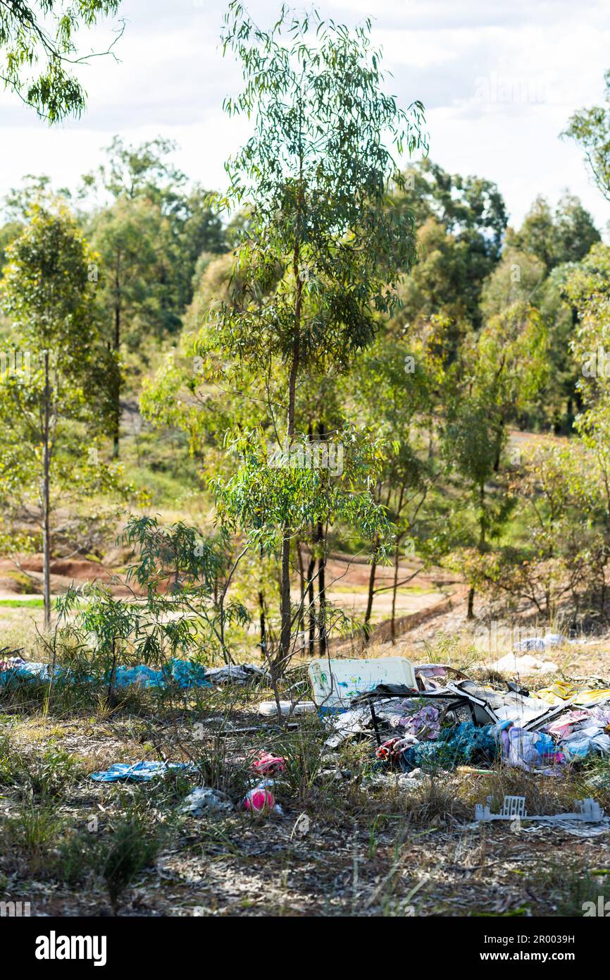 dumping rubbish on rural land Stock Photo Alamy