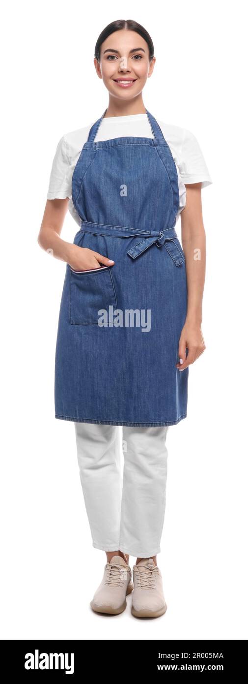 Young woman in blue jeans apron on white background Stock Photo - Alamy