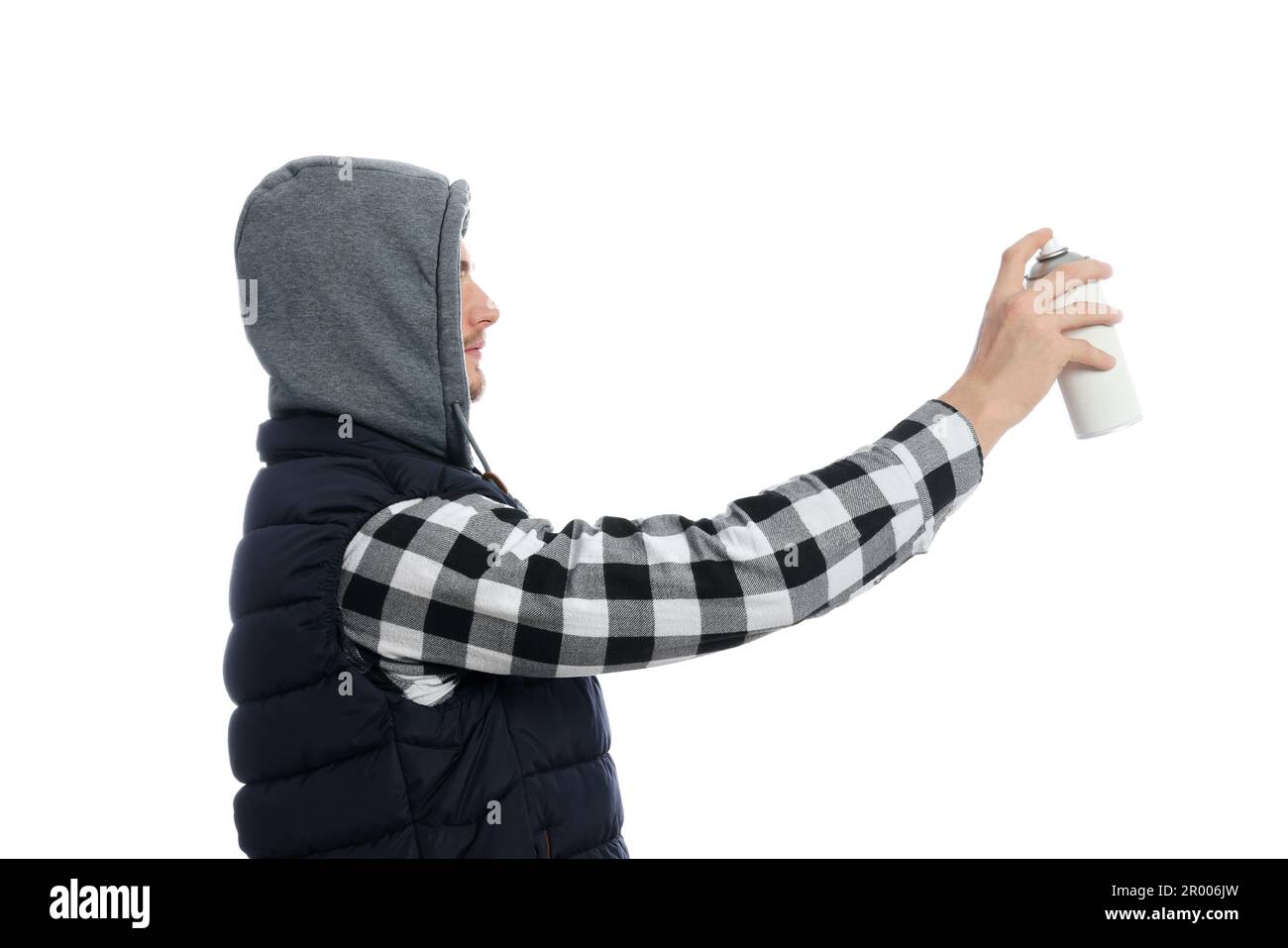 Man holding can of spray paint on white background Stock Photo - Alamy