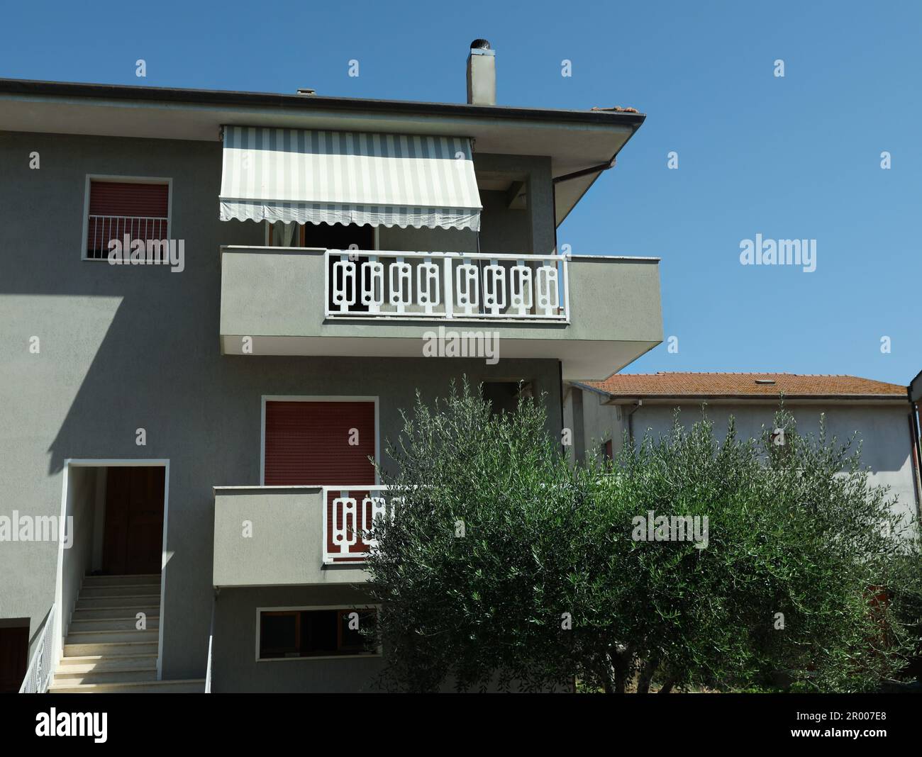 Exterior of residential building with balconies on sunny day Stock ...