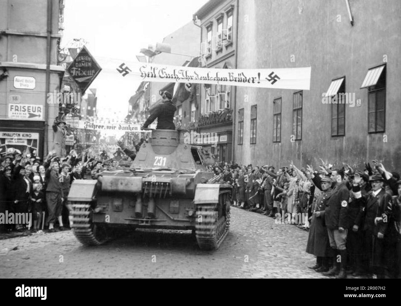 Heavy German Tanks drive through the city of Komtau in the Sudeten on 9.Oct.1938 fter the annexation of the Sudetenland. After the annexation of Austria, Hitler demanded that he be given the Sudeten region of Czechoslovakia. At the Munich conference in September 1938 the Western powers agreed to this and the nazis occupied the area. Not long after Hitler broke his promise and invaded the rest of Czechoslovakia before turning his attention to Poland. Bundesarchiv, Bild 146-1969-065-26 / CC-BY-SA 3.0 Stock Photo