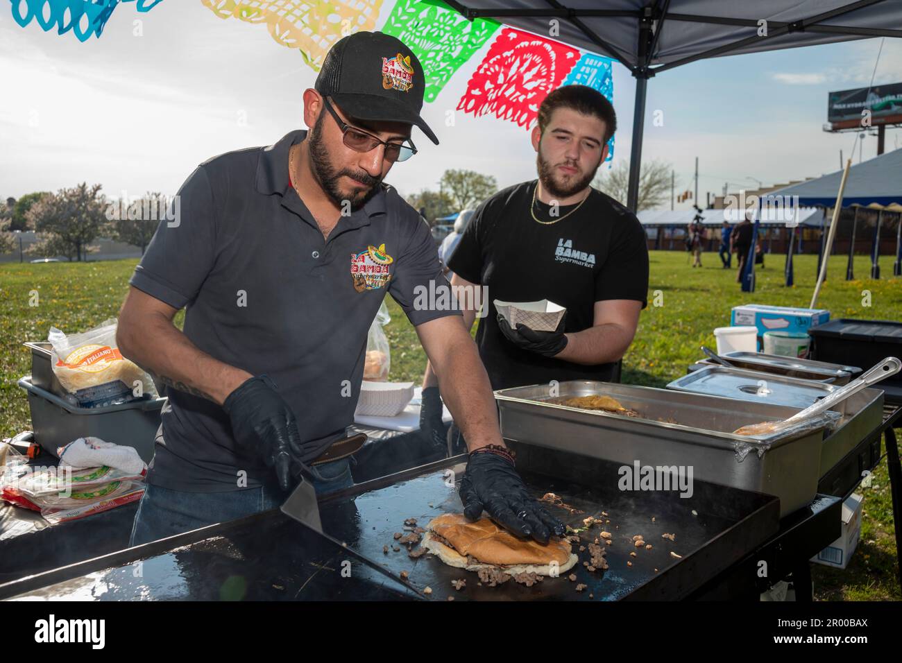 Detroit, Michigan, USA. 5th May, 2023. Workers from La Bamba Supermarket cook during the celebration of the Cinco de Mayo holiday in the Mexican-American community. Credit: Jim West/Alamy Live News Stock Photo