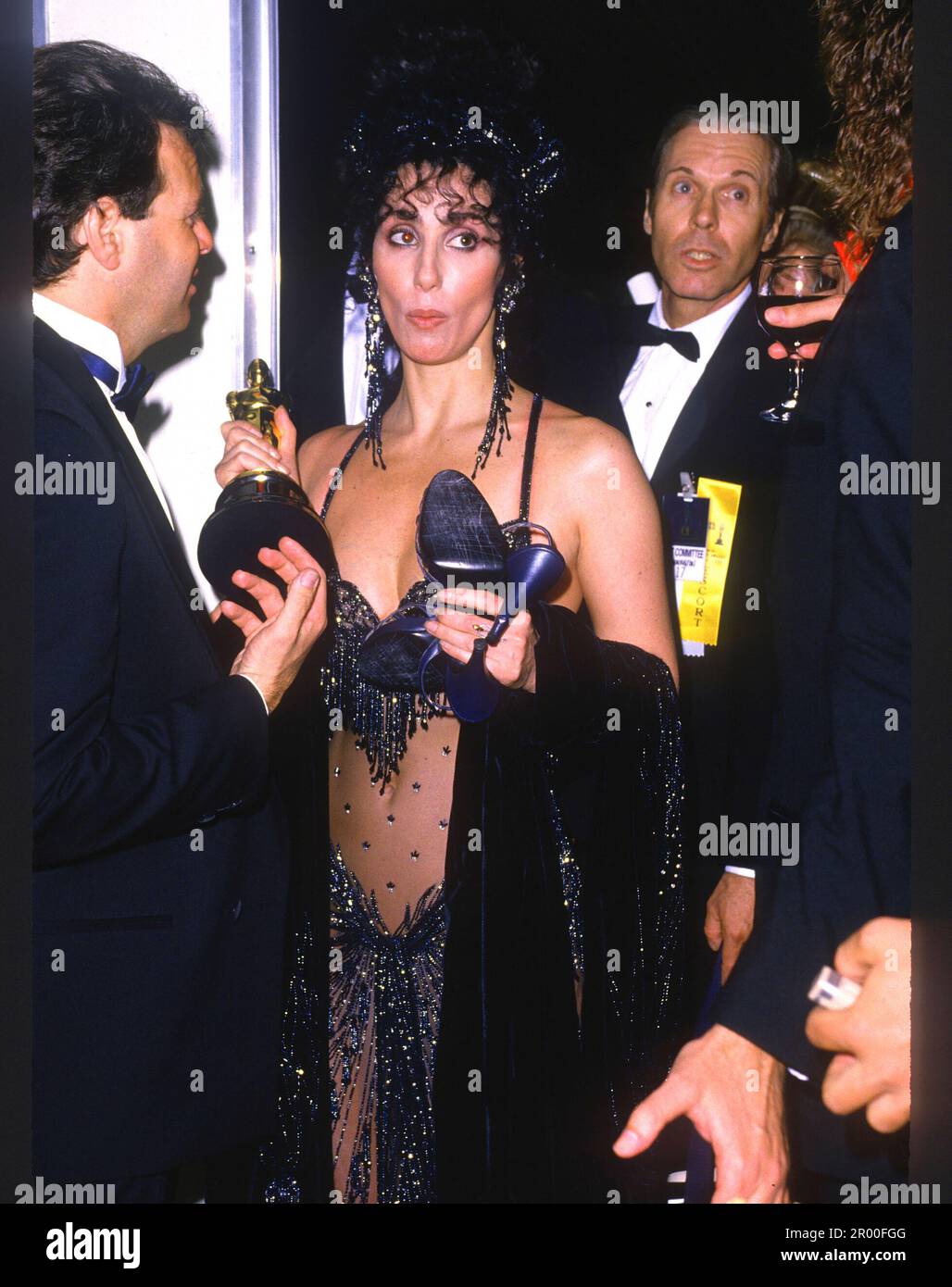 Cher Leaving the Academy Awards after winning ‘Best Actress’ for Moonstruck, 1988 Credit: Ron Wolfson  / MediaPunch Stock Photo