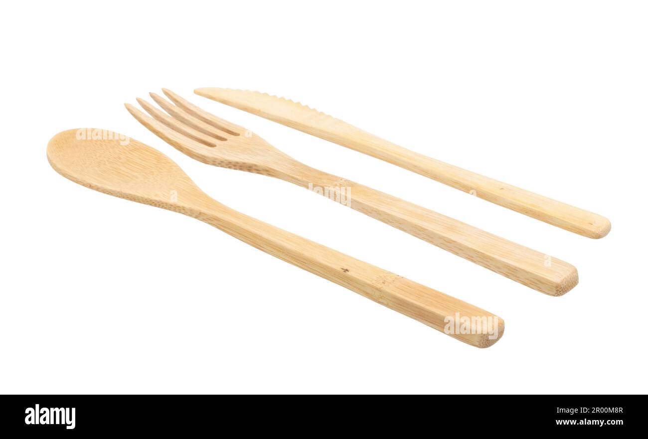 Bamboo wood cutlery, disposable fork, spoon,knife made of natural material isolated on white background Stock Photo