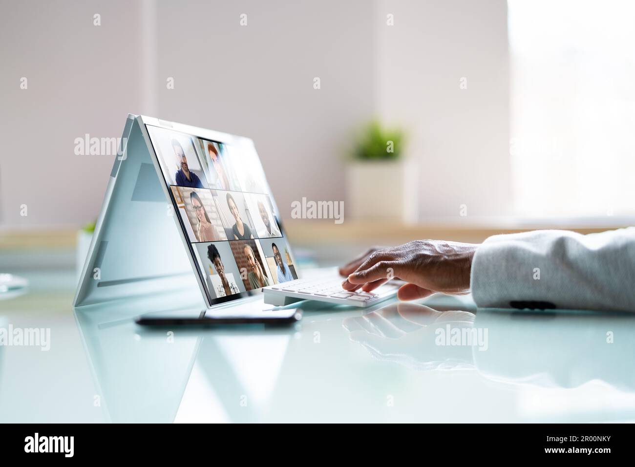 Virtual Business Presentation Or Videoconferencing On Hybrid Screen Stock Photo