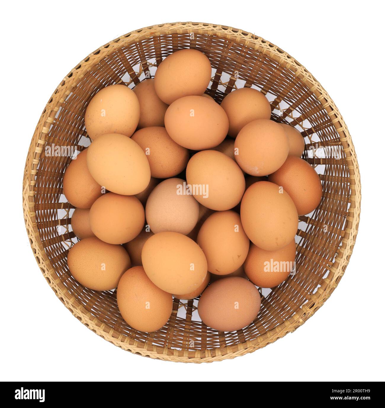 Eggs in basket isolated on white background Stock Photo