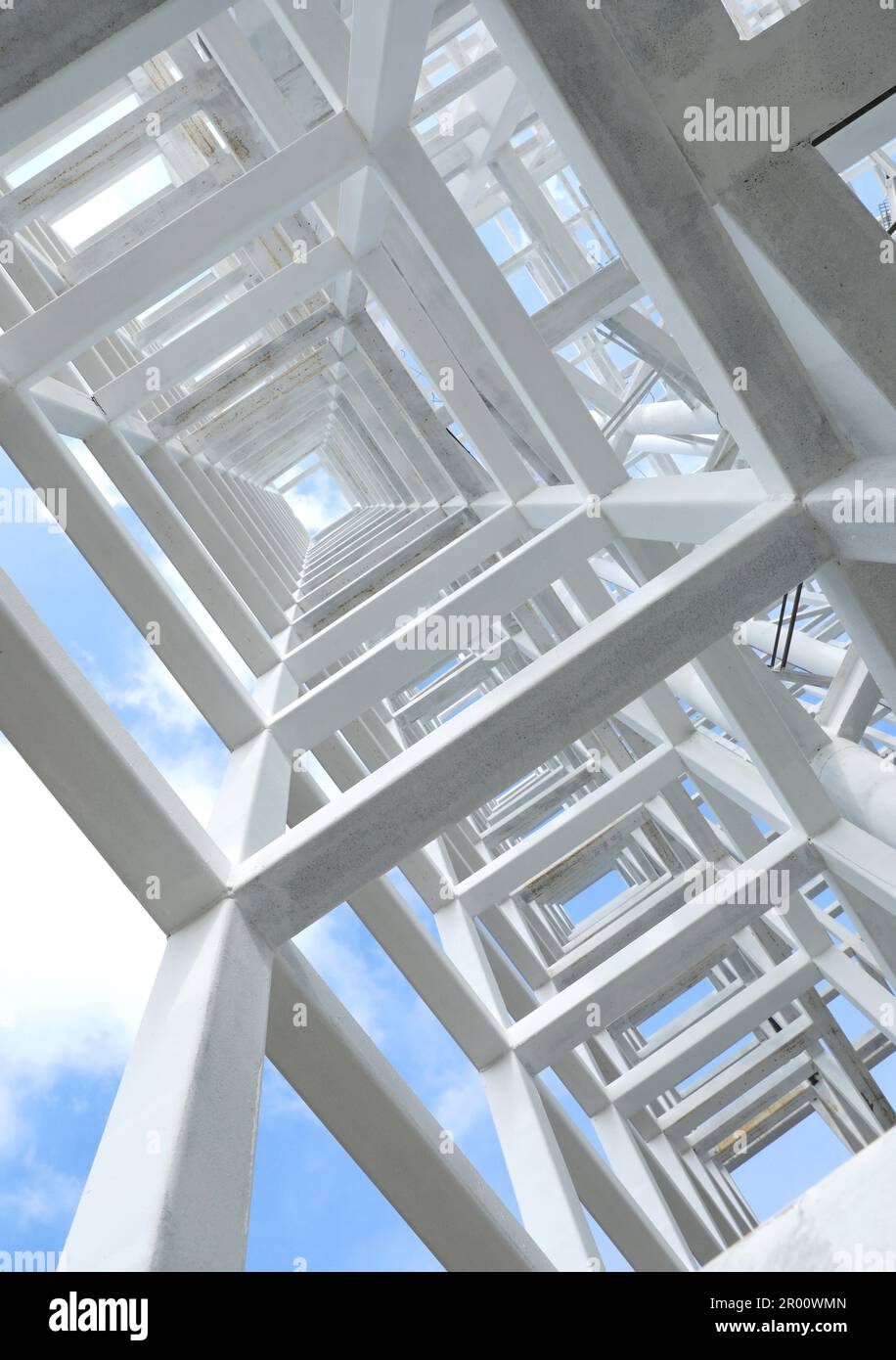 White Steel beam construction with blue sky background Stock Photo