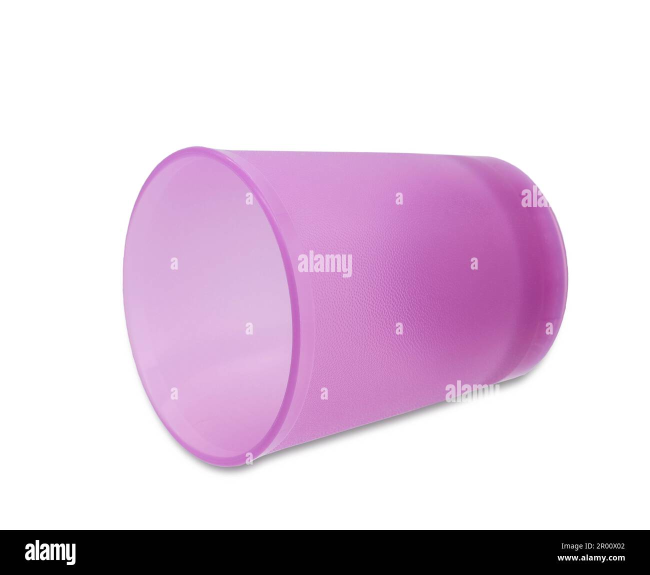 Purple cup lying isolated on white background Stock Photo Alamy