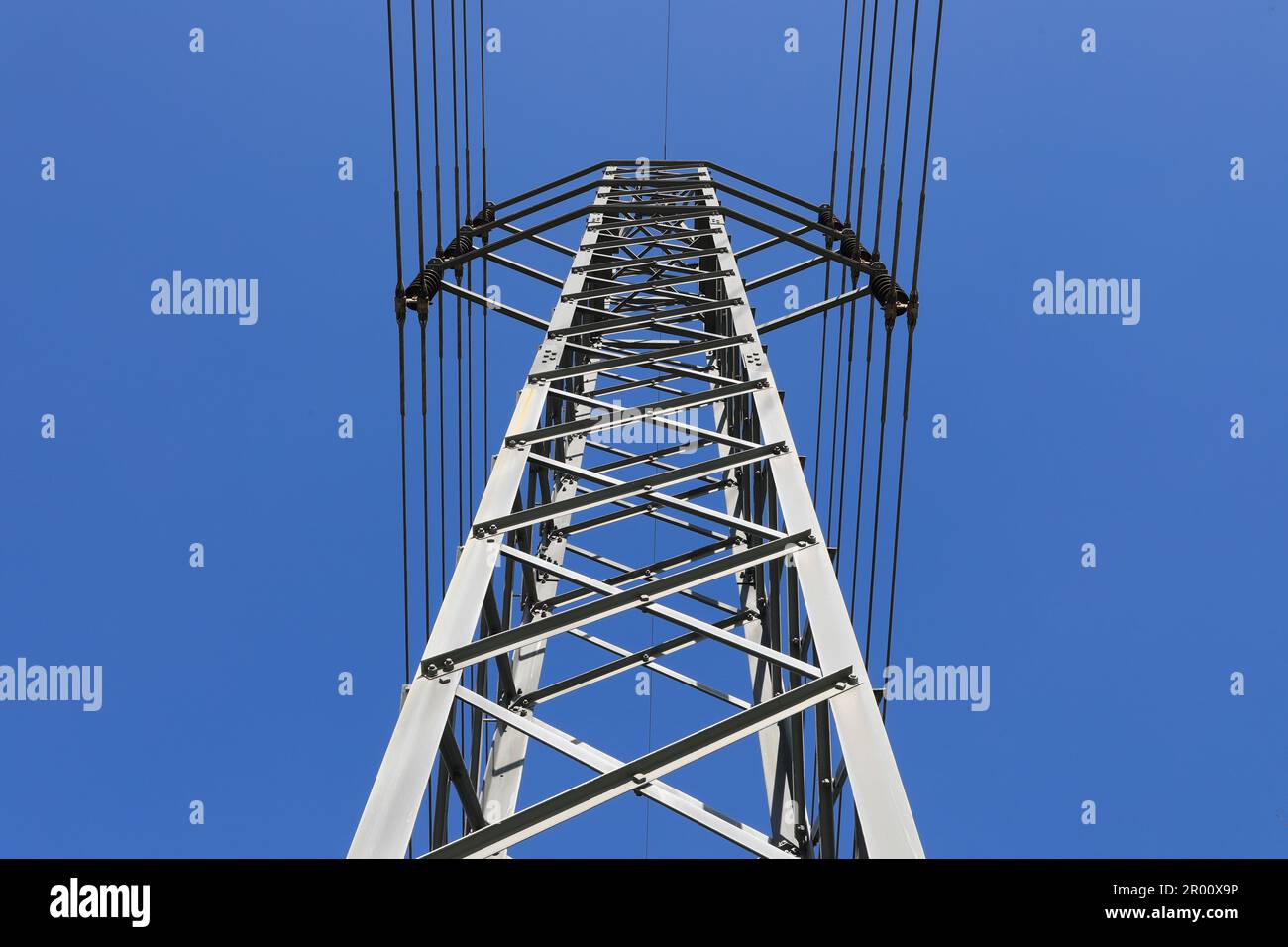 Electric high voltage power post with blue sky Stock Photo