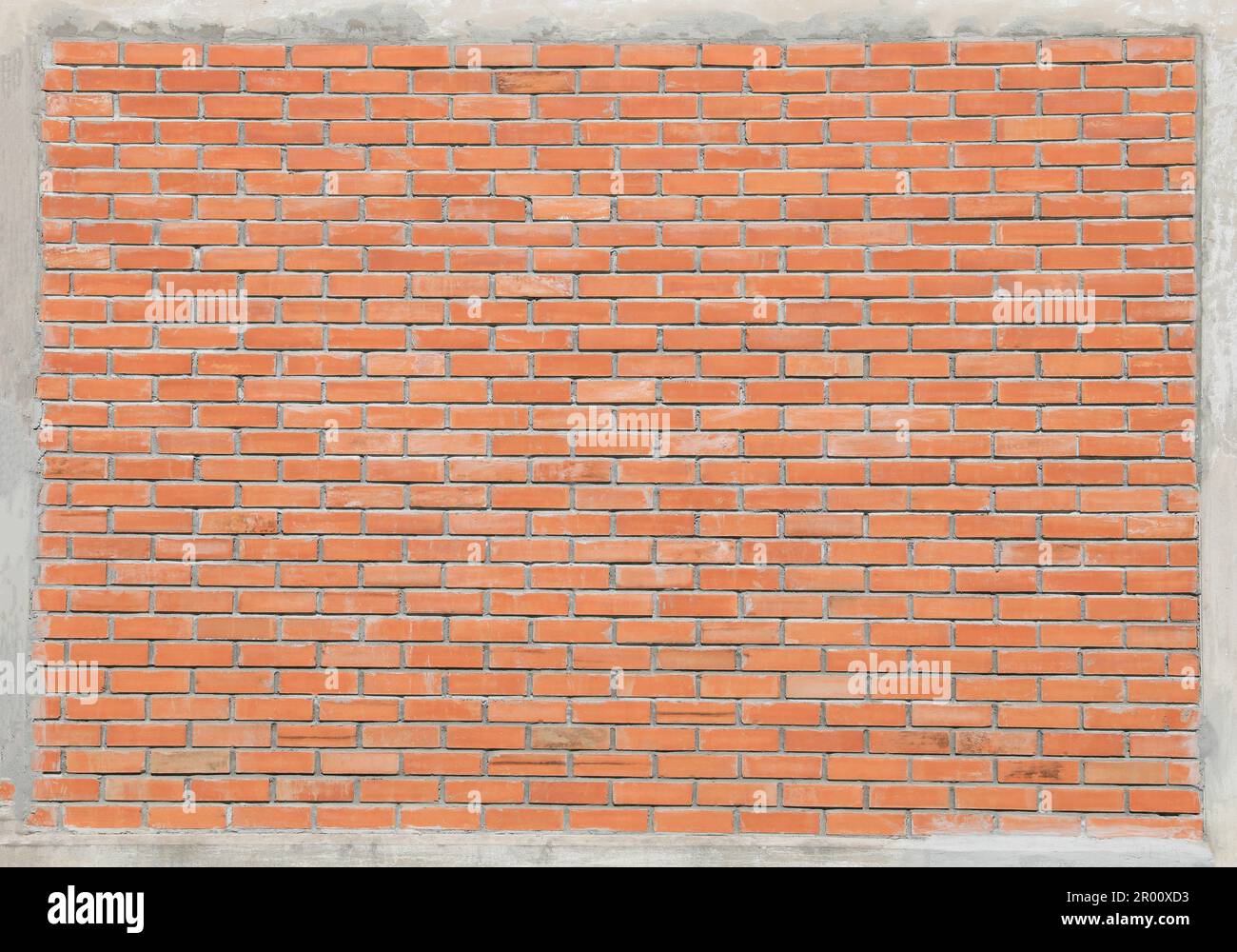 Red bricks wall with cement frame Stock Photo