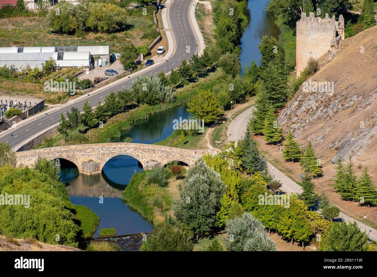 Puente romano sobre el río Ucero y Torre del agua, Soria, Comunidad Autónoma de Castilla, Spain, Europe Stock Photo
